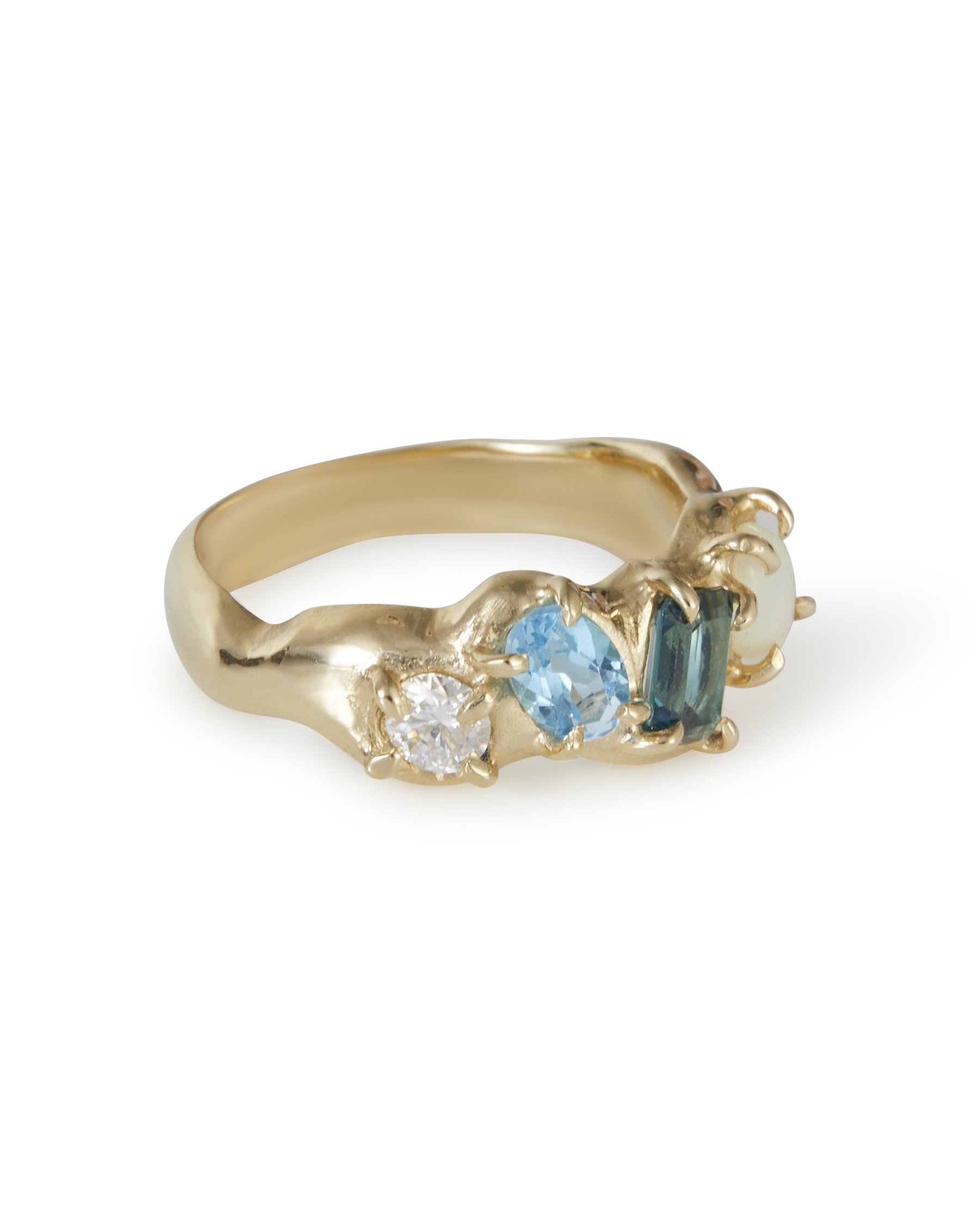 A 4 stone claw set ring that is molten with blue stones and opal
