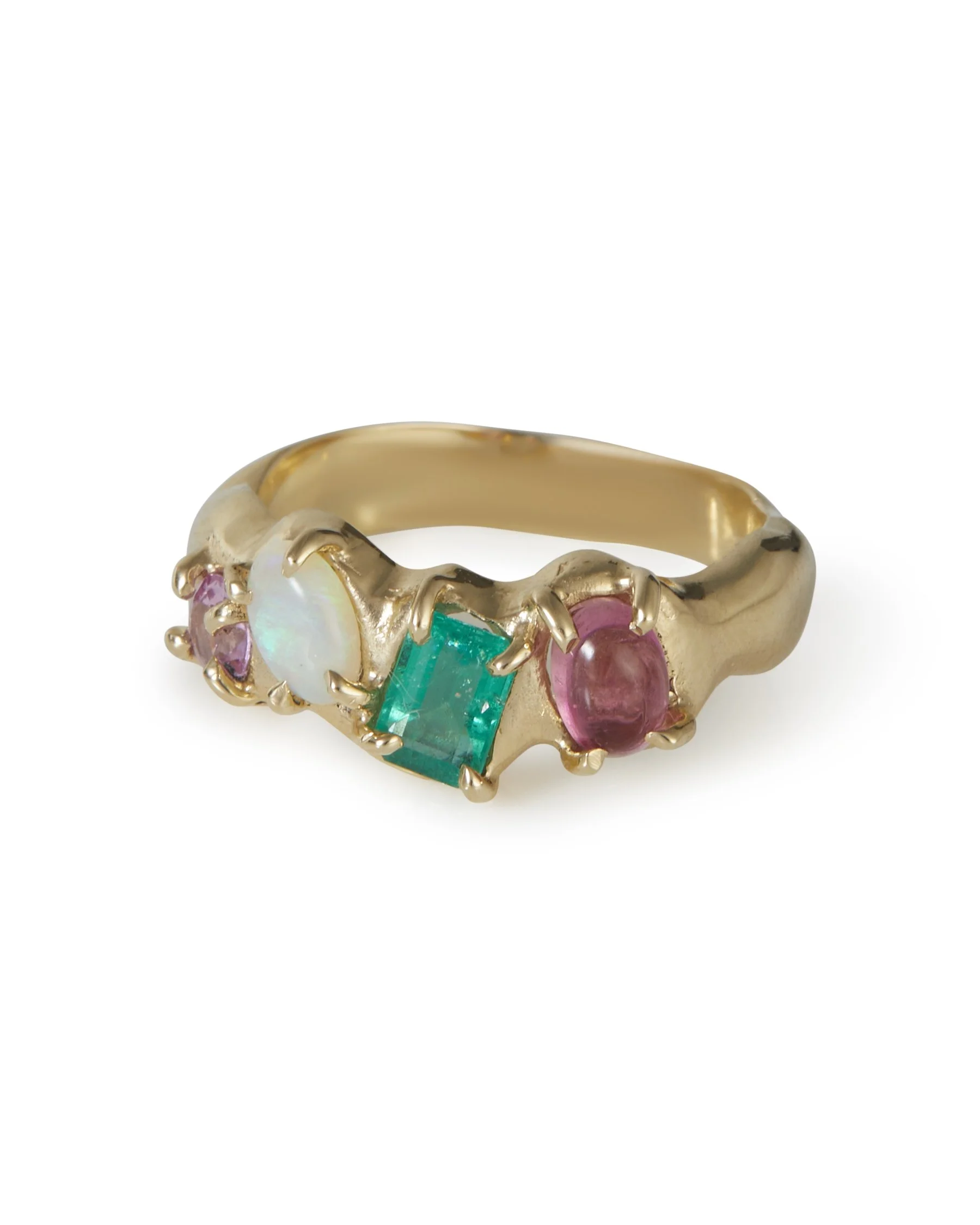 A 4 stone claw set ring that is molten with pink and green stones and opal
