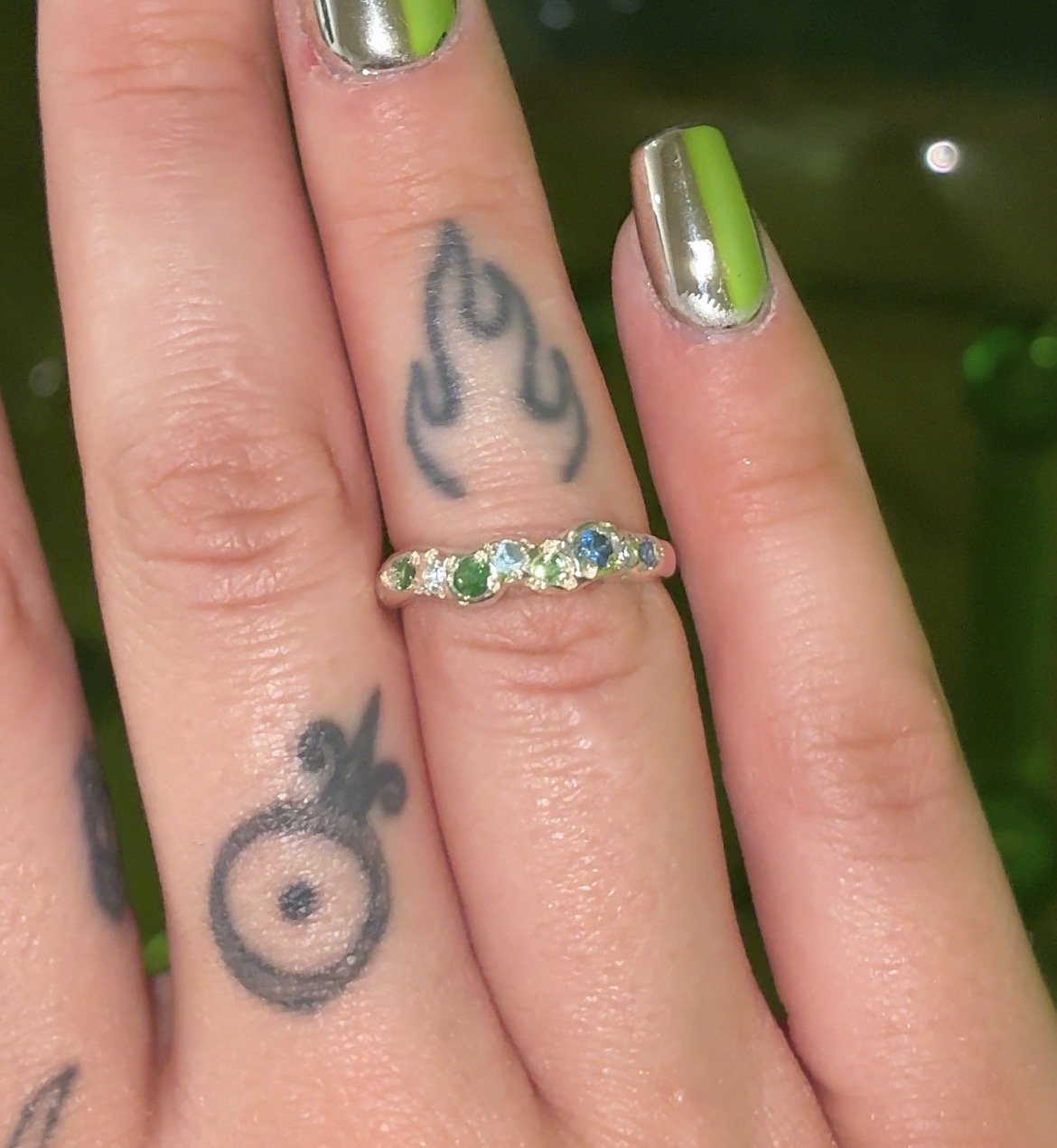 Earth silver ring - a molten silver band with blue and green gemstones