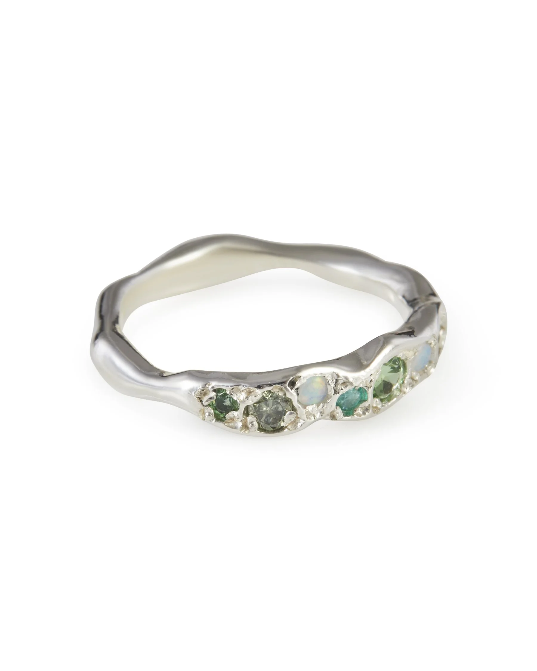 Angled view of the Moss Colne Ring featuring green diamond, opal, chrome tourmaline and tsavorite garnet.
