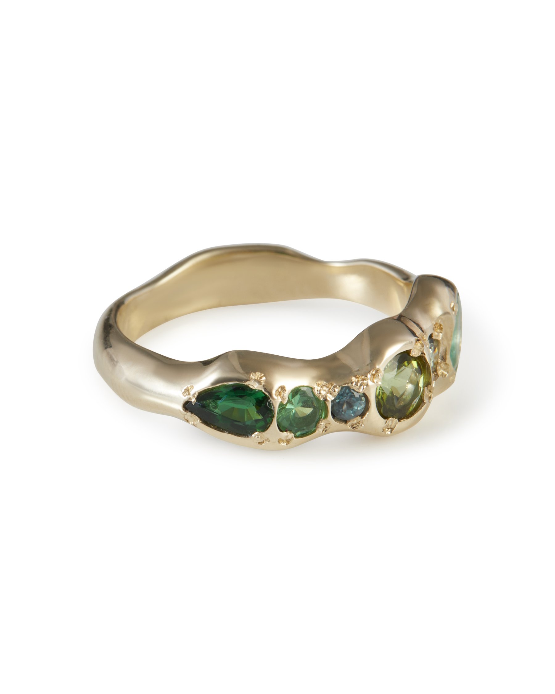 Side profile of the Pickle Pointer Band in 9ct yellow gold with emerald, tourmaline and green diamond.