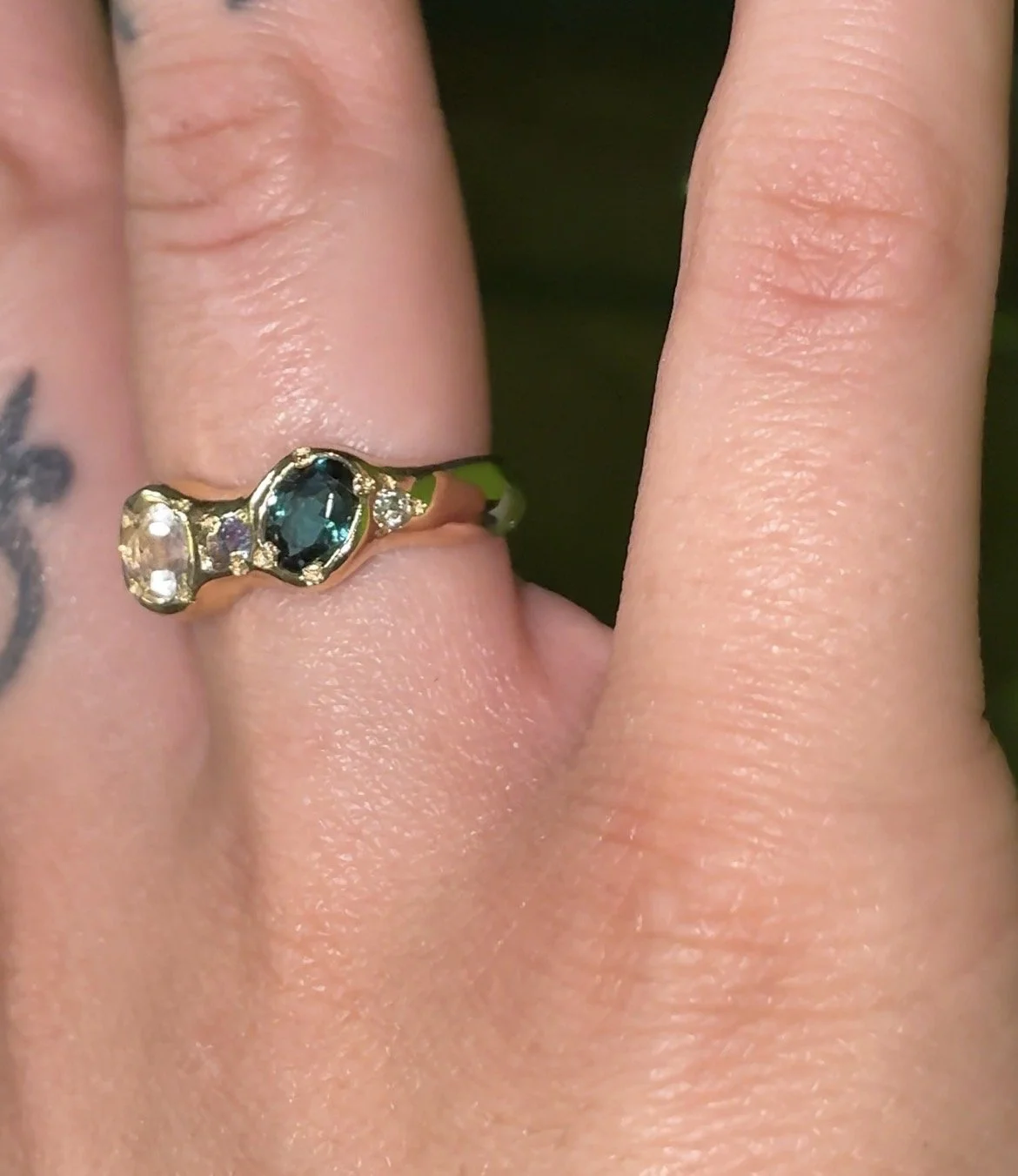 Mercury Gold band - a gold molten ring inspired by mercury with blue, purple and white stones