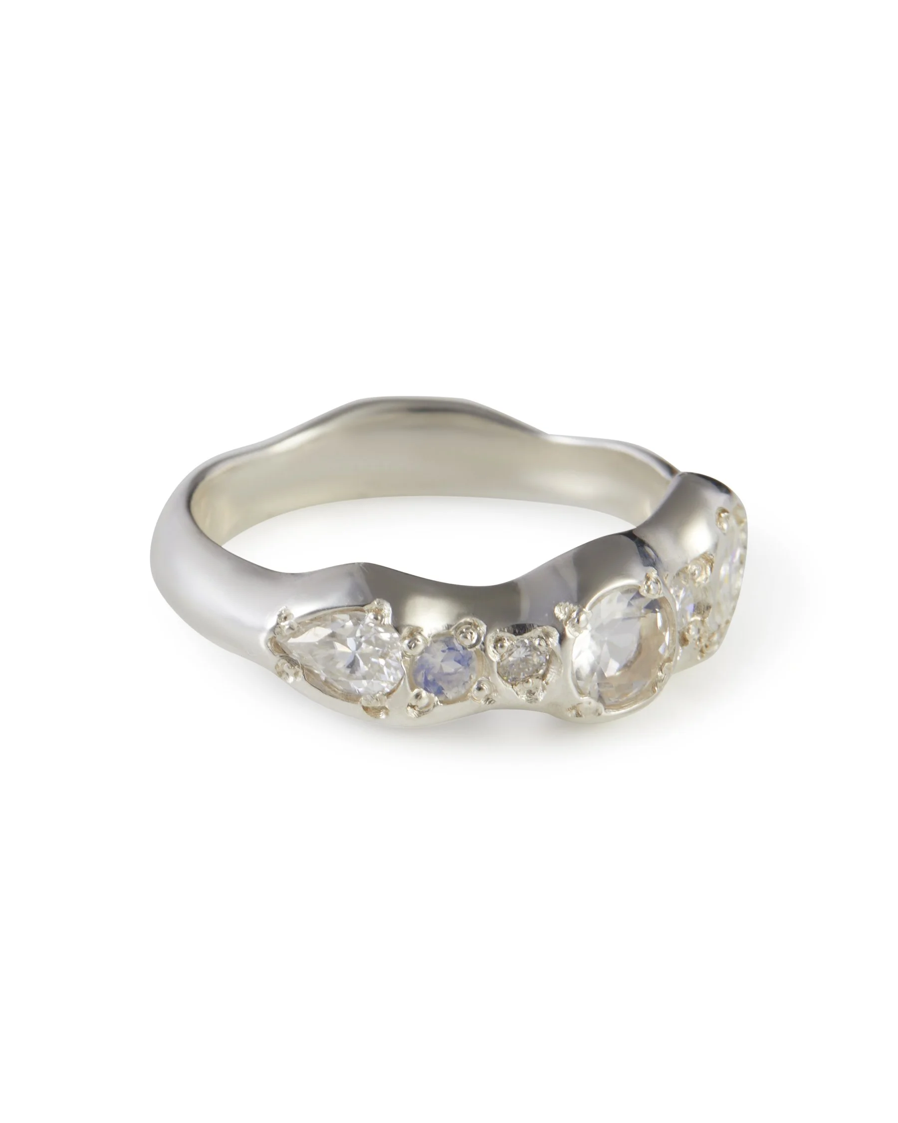 Side profile of the Moonlight Pointer Band with moonstone and lab grown moissanite accents.