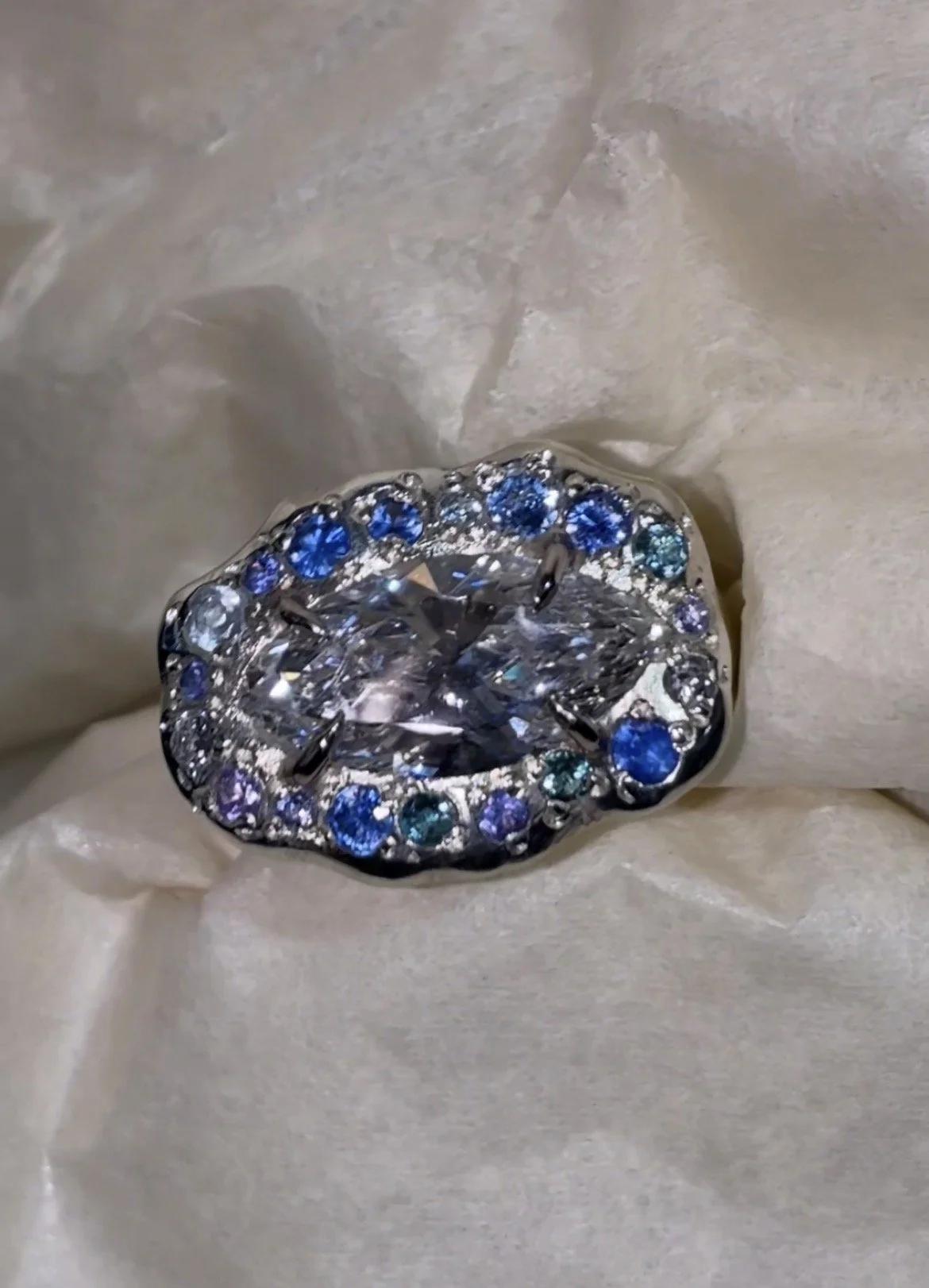 Mercury Staement Ring - A large white gold ring with purple and blue gemstones and a central marquise lab grown diamond