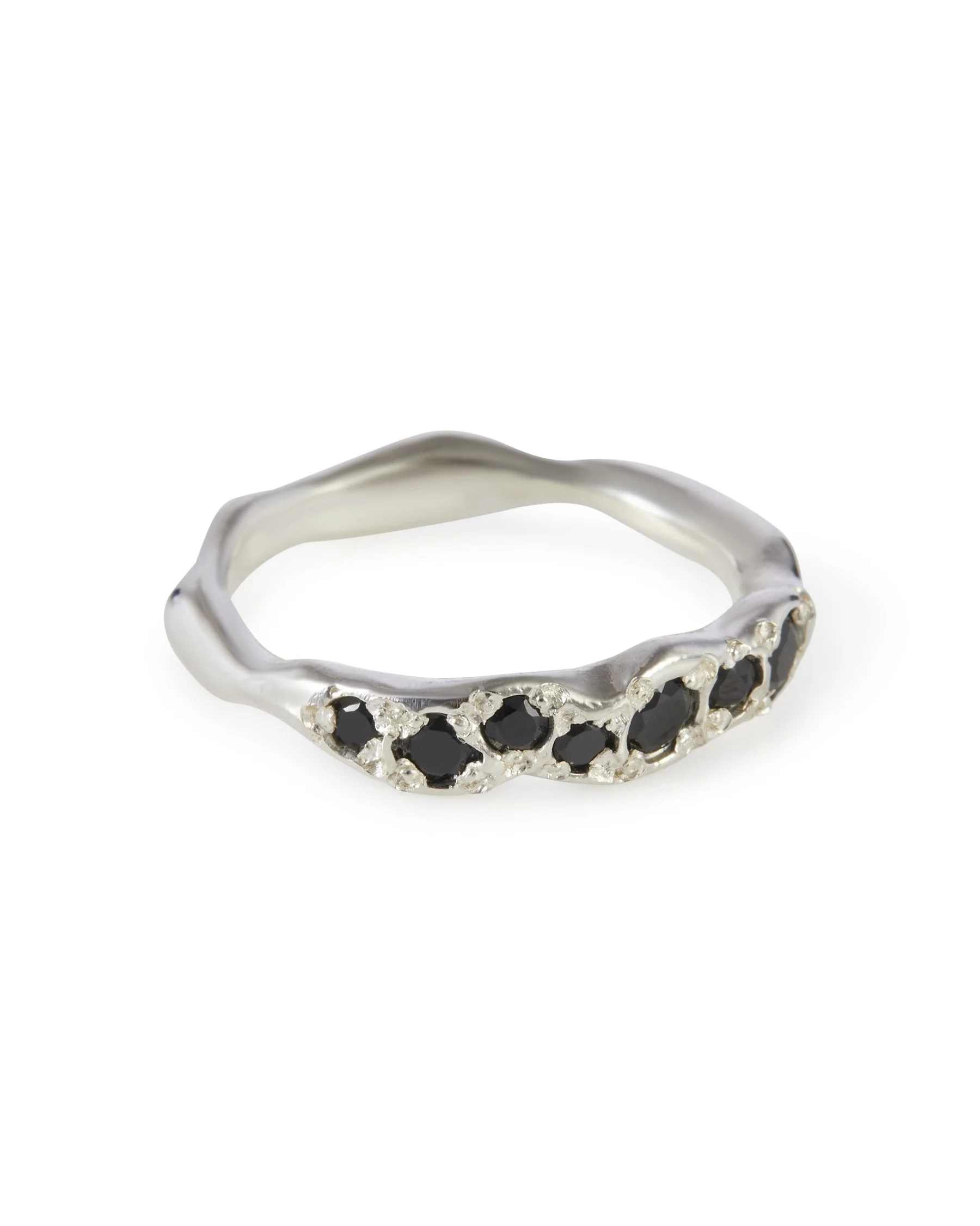 Angled view of the Punk Colne Ring featuring a black spinel set in sterling silver.