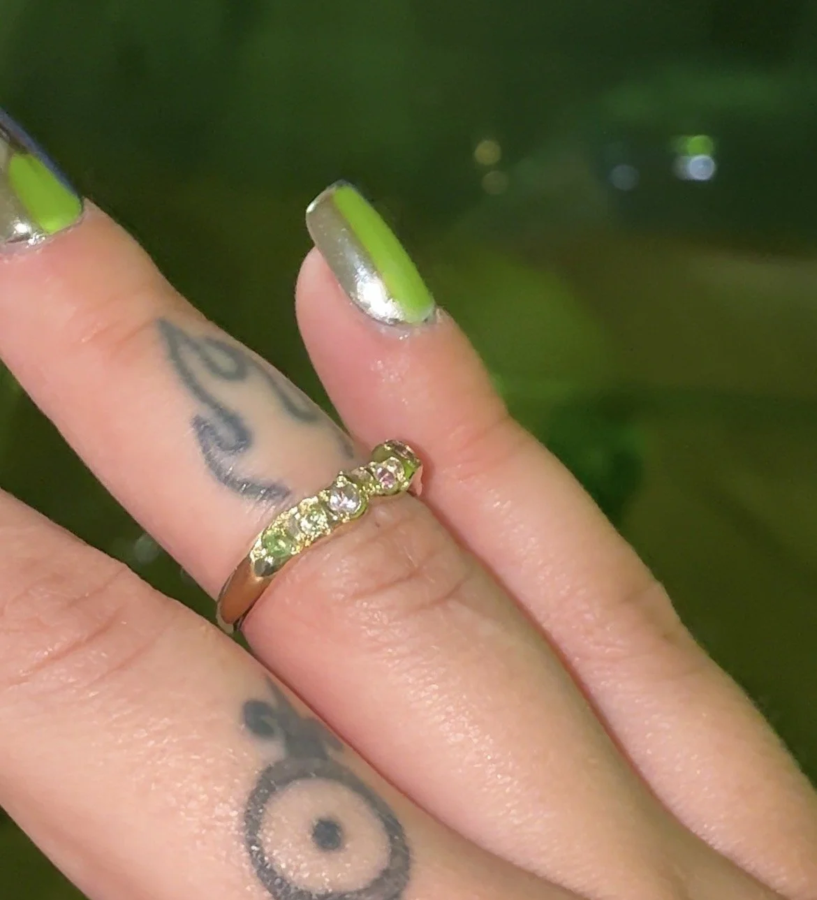 Venus band gold - a gold molten band with green and pink gemstones inspired by venus