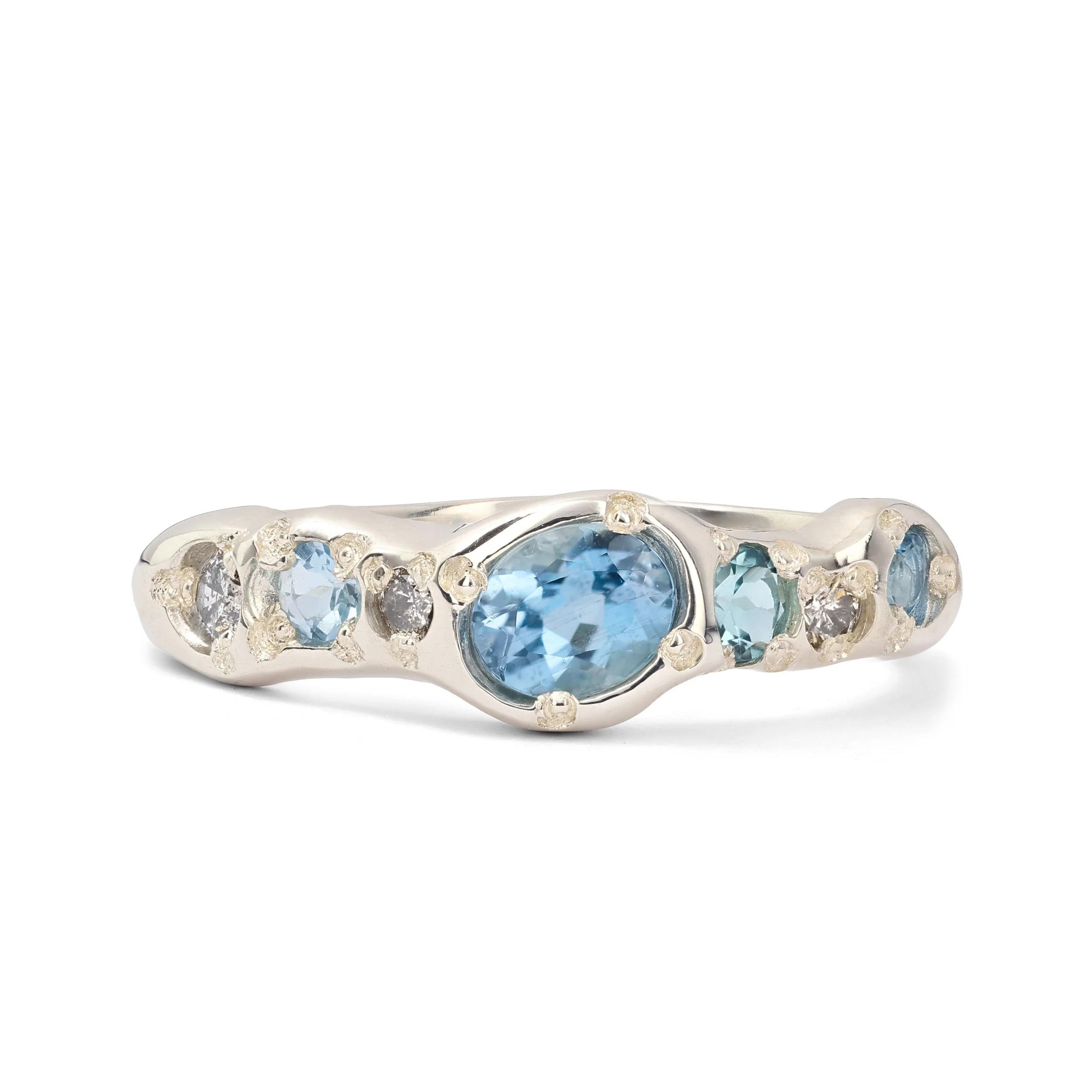 Uranus Ring silver - A molten silver ring with aquamarine and salt and pepper diamonds