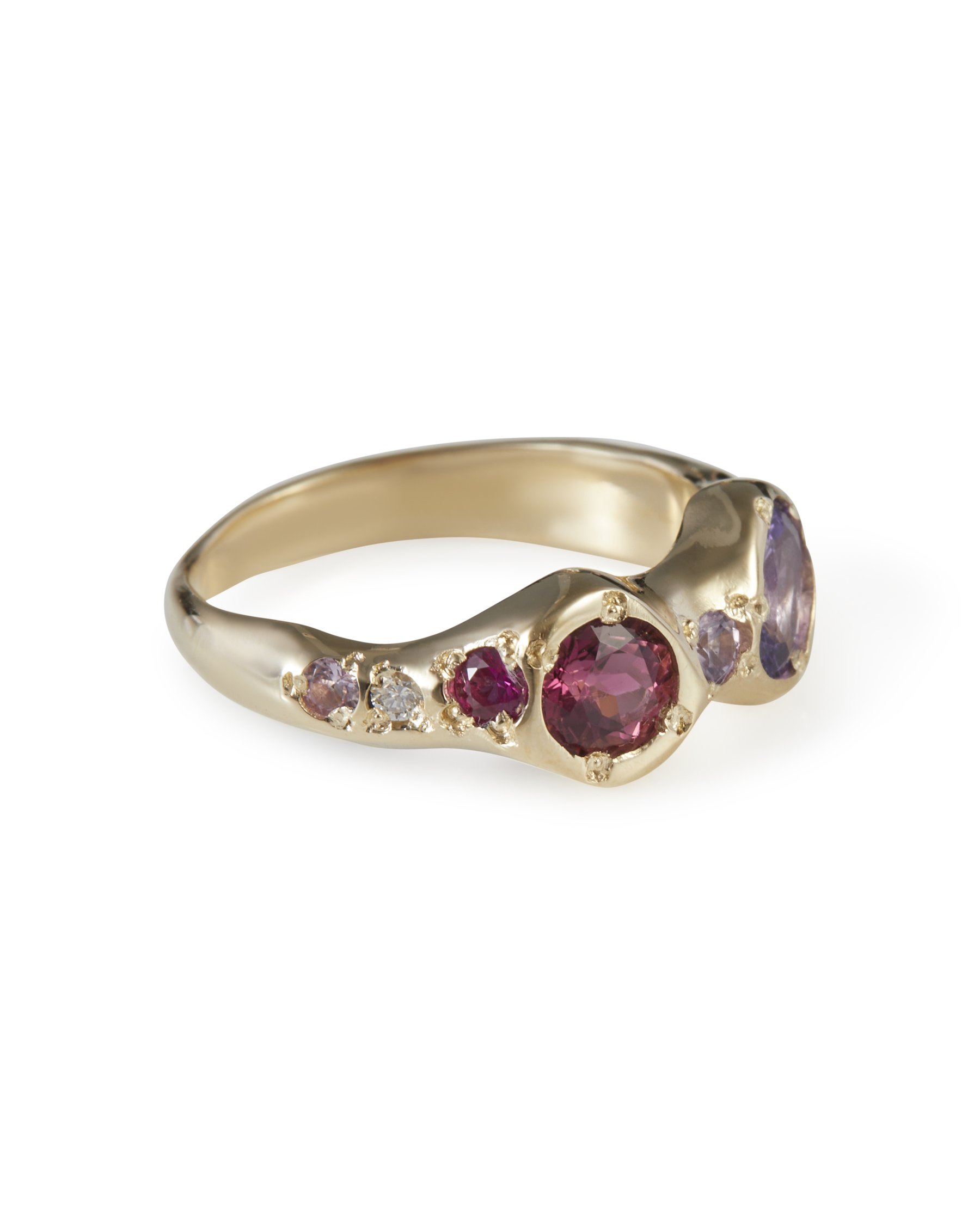 Side profile of the Madeline Alien Eyes Ring in 9ct yellow gold with amethyst, sapphire and tourmaline gemstones.