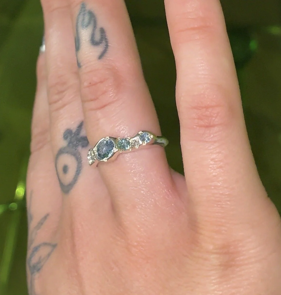 Uranus Ring silver - A molten silver ring with aquamarine and salt and pepper diamonds