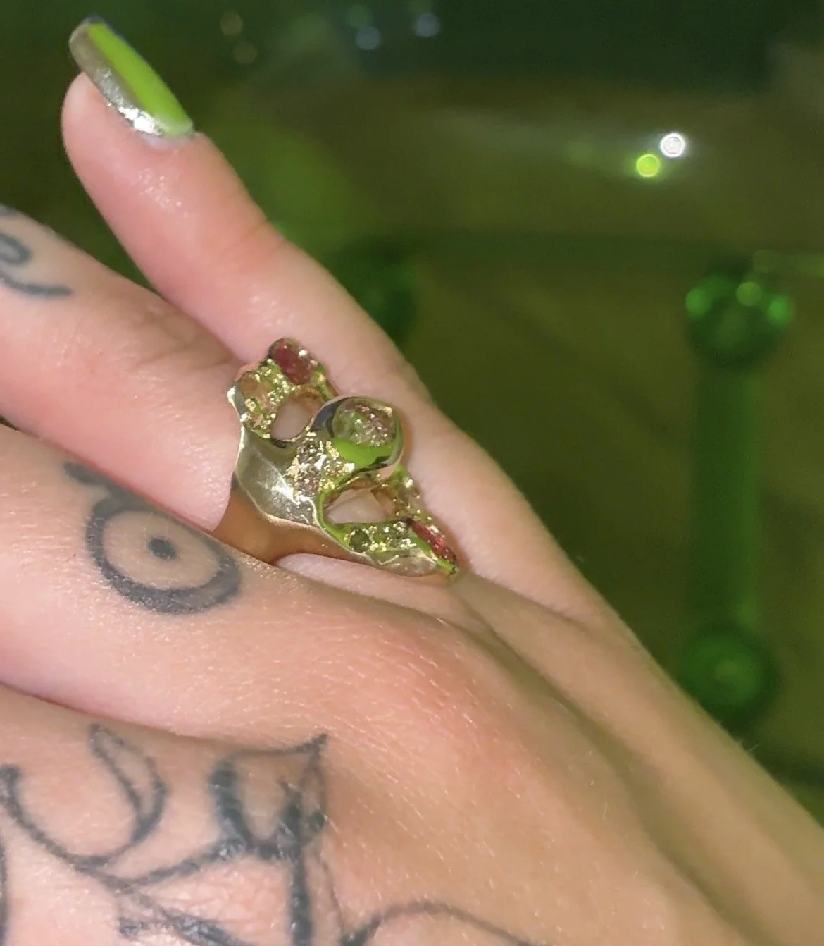 Saturn statement ring - a gold ring with pink tourmalines and brown diamonds