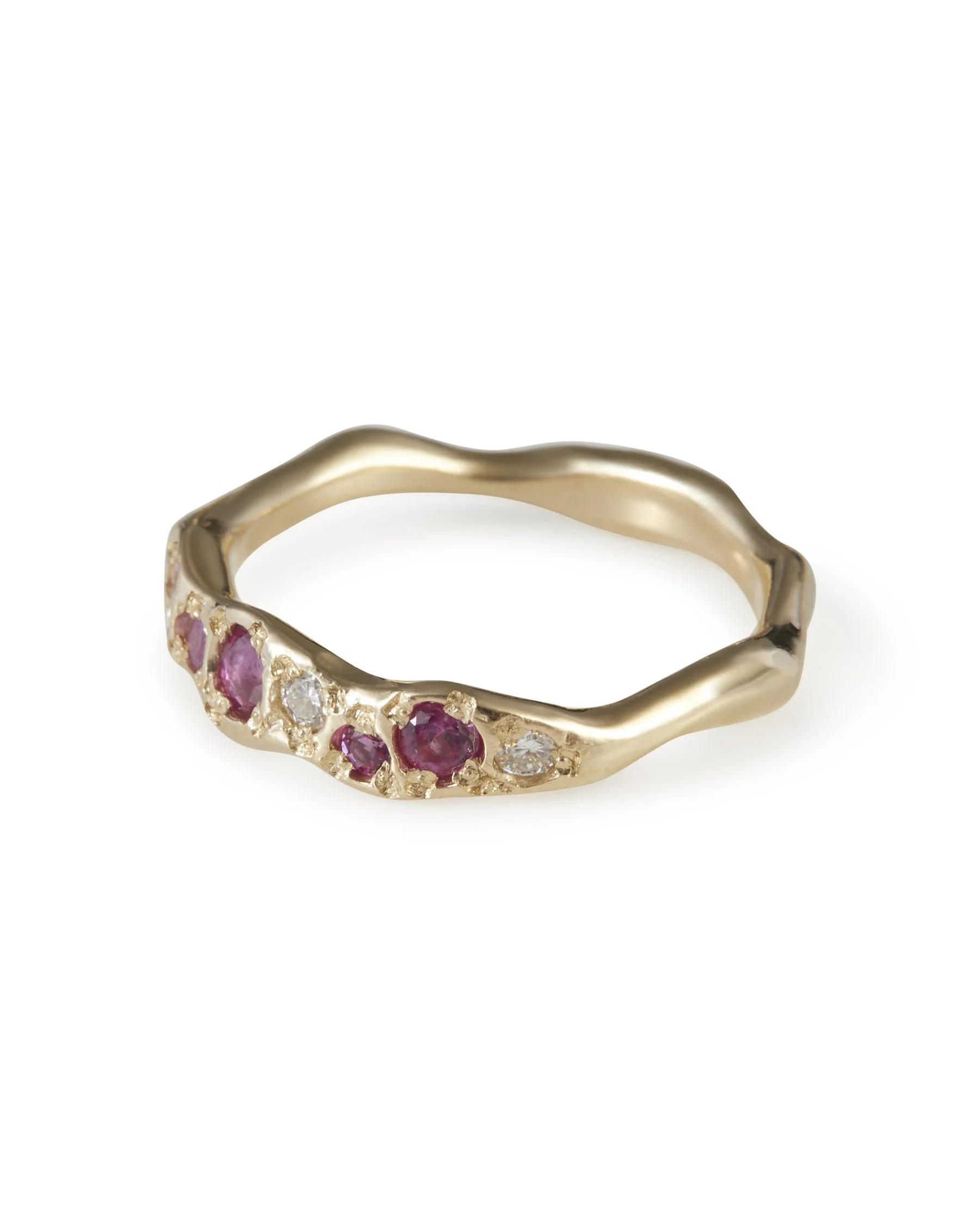 Side profile of the July Colne Ring in 9ct yellow gold with pink sapphire and lab grown moissanite.