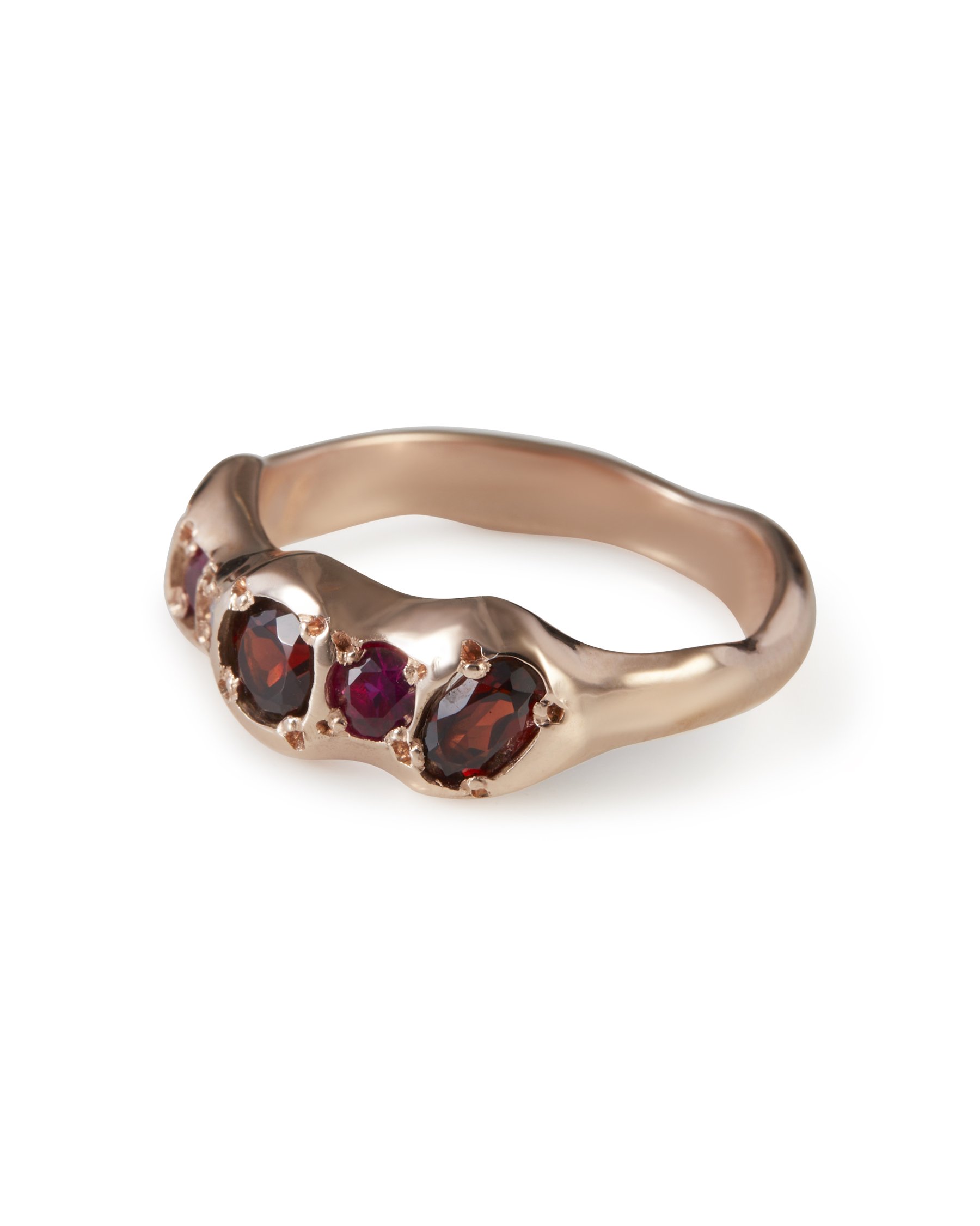 Side profile of the Red Pointer Ring in 9ct red gold with garnet and pink sapphire gemstones.