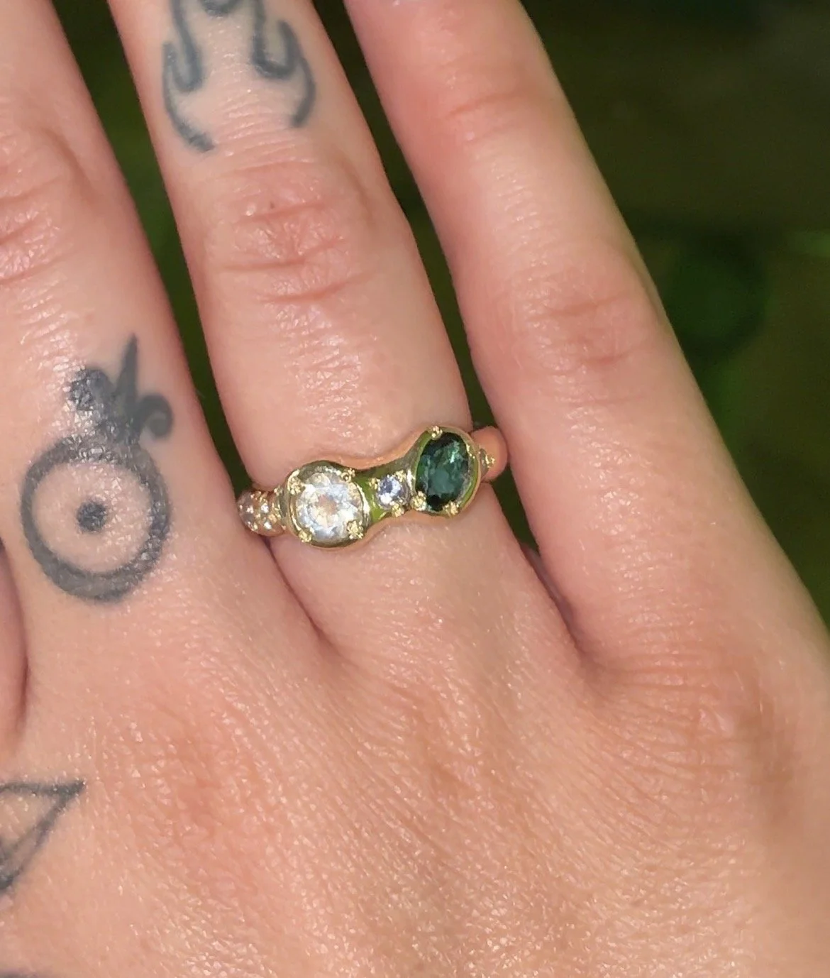 Mercury Gold band - a gold molten ring inspired by mercury with blue, purple and white stones