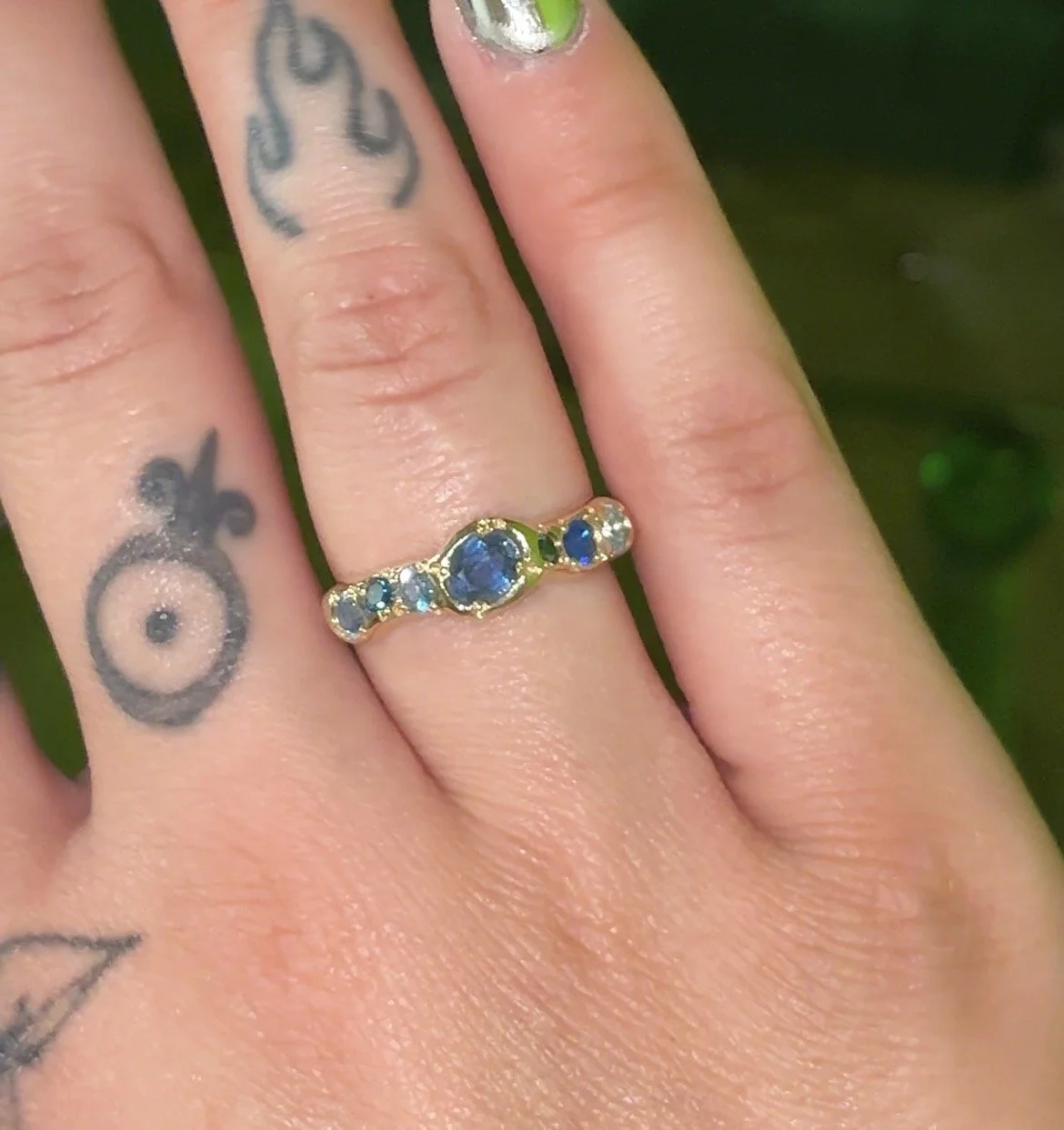 Neptune Band Gold - a gold molten band with blue diamonds, topaz and sapphire