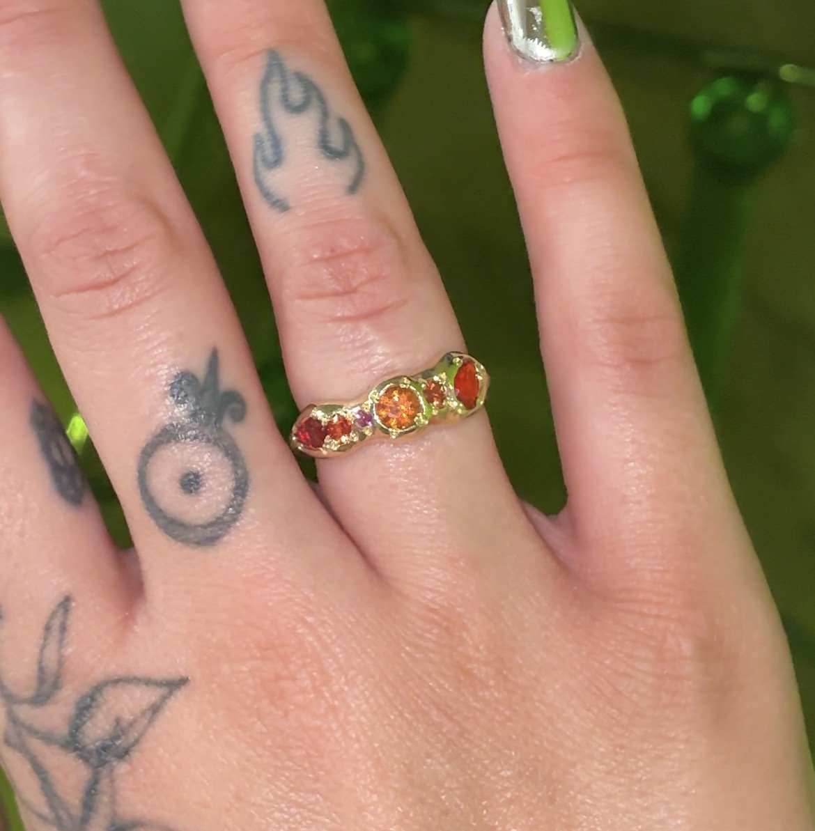 Mars Band Gold - A yellow gold molten band with orange sapphires and fire opal