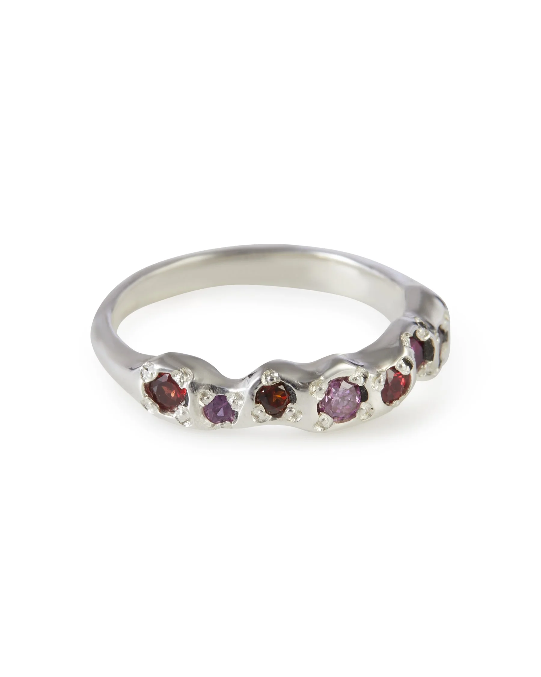 Angled view of the Red Wine Mini Band 2.0 featuring red sapphire, garnet, pink sapphire and pink diamond.