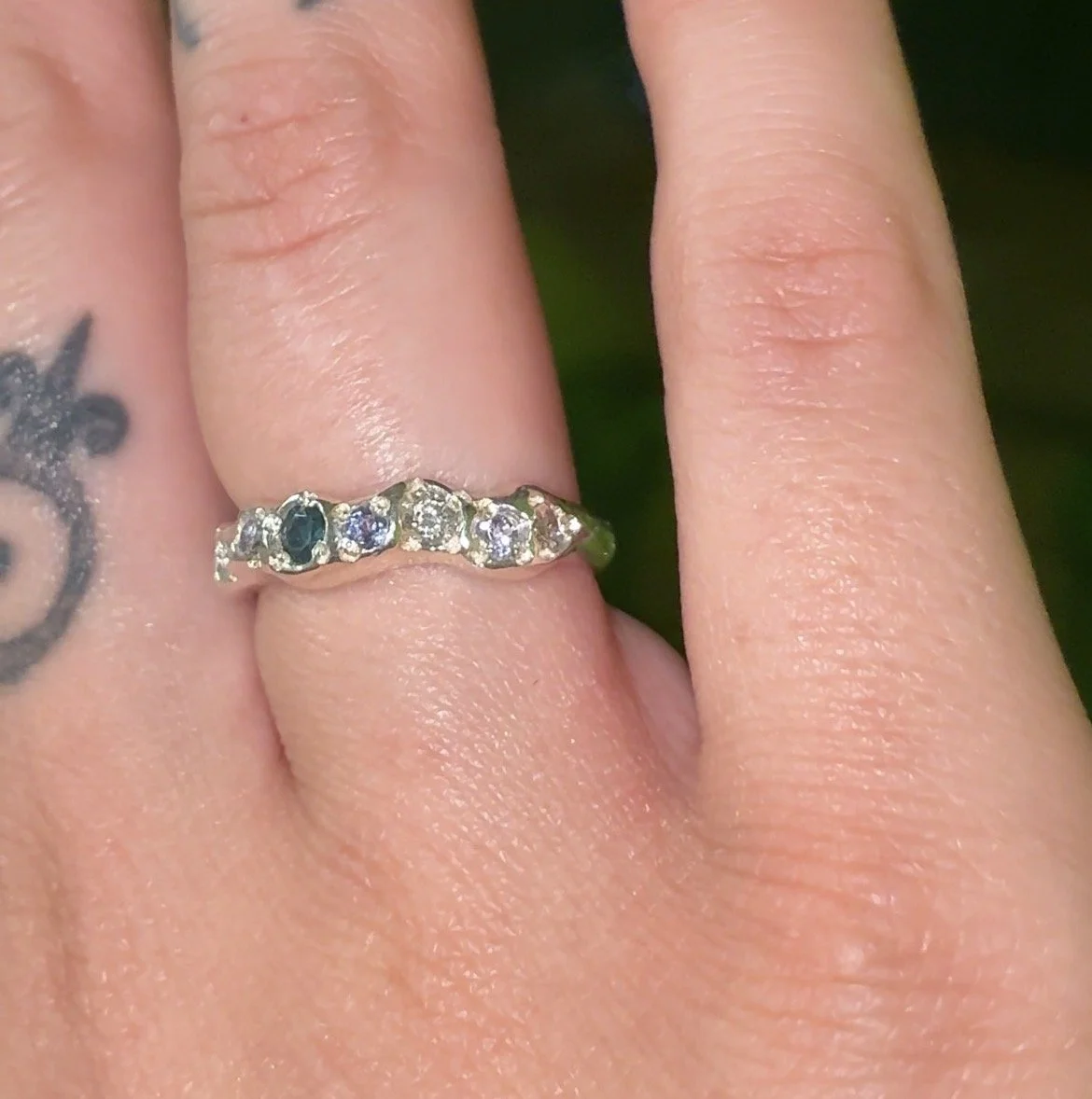 Mercury Silver band - A SILVER MOLTEN BAND RING WITH BLUE TOURMAOINE, TANZANITE AND SALT AND PEPPER DIAMONDS