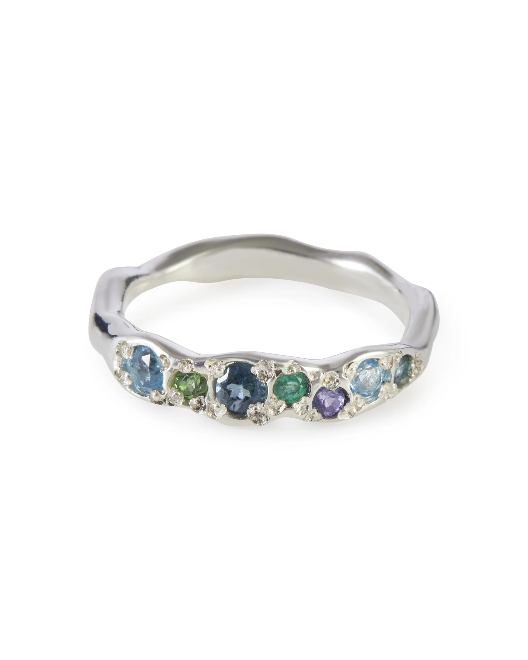 Earth Colne Ring in sterling silver with tsavorite garnet, tanzanite, blue topaz, tourmaline and lab grown emerald gemstones.