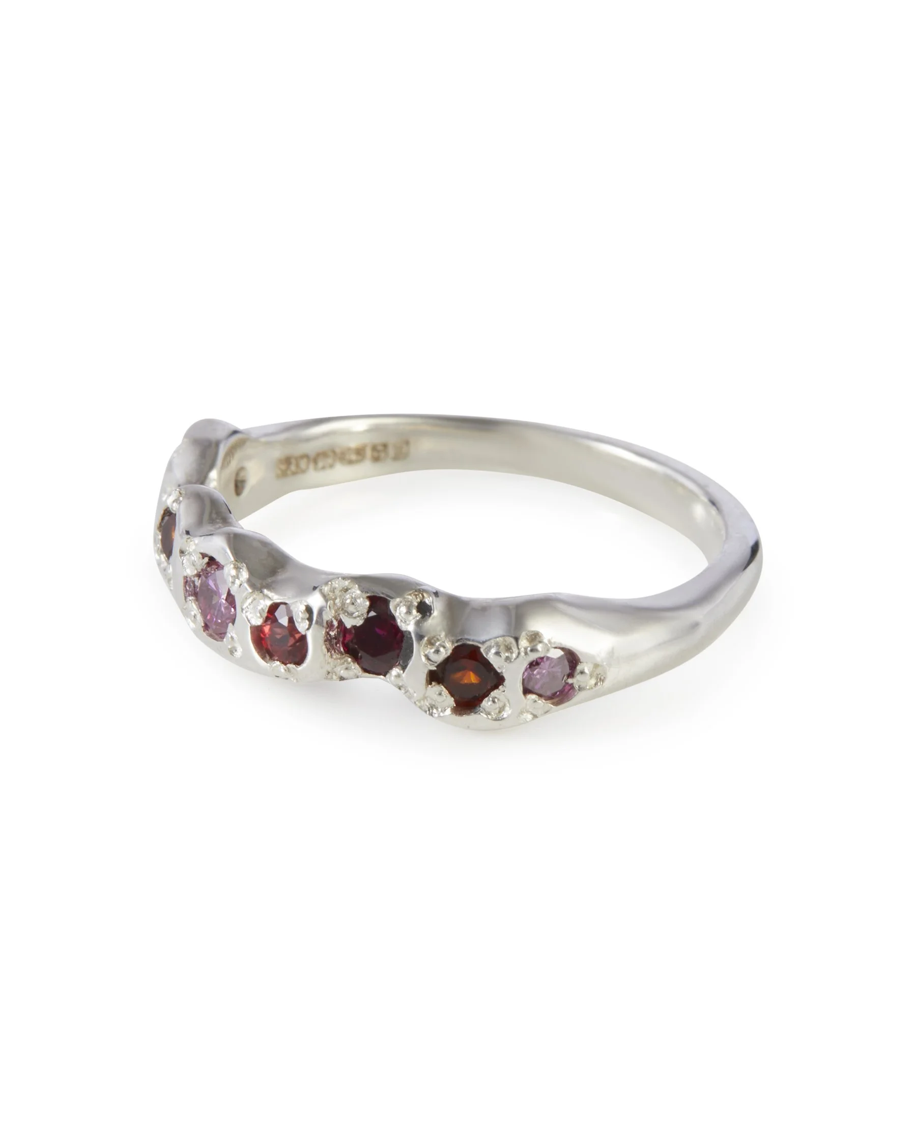 Side profile of the Red Wine Mini Band 2.0 in sterling silver with red and pink gemstones.