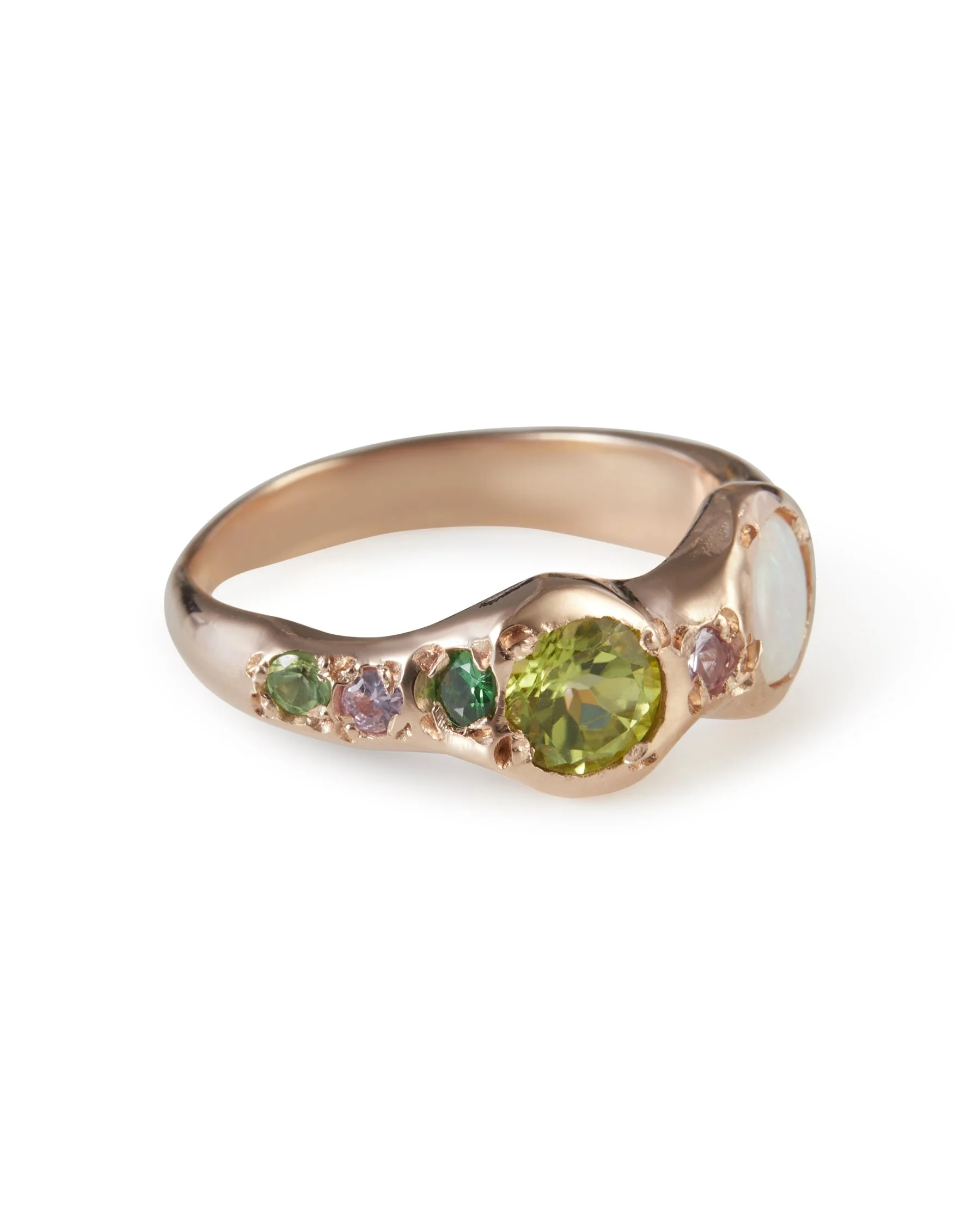 Angled view of the Cosmo and Wanda Alien Eyes Band featuring multicolour gemstones in 9ct red gold.