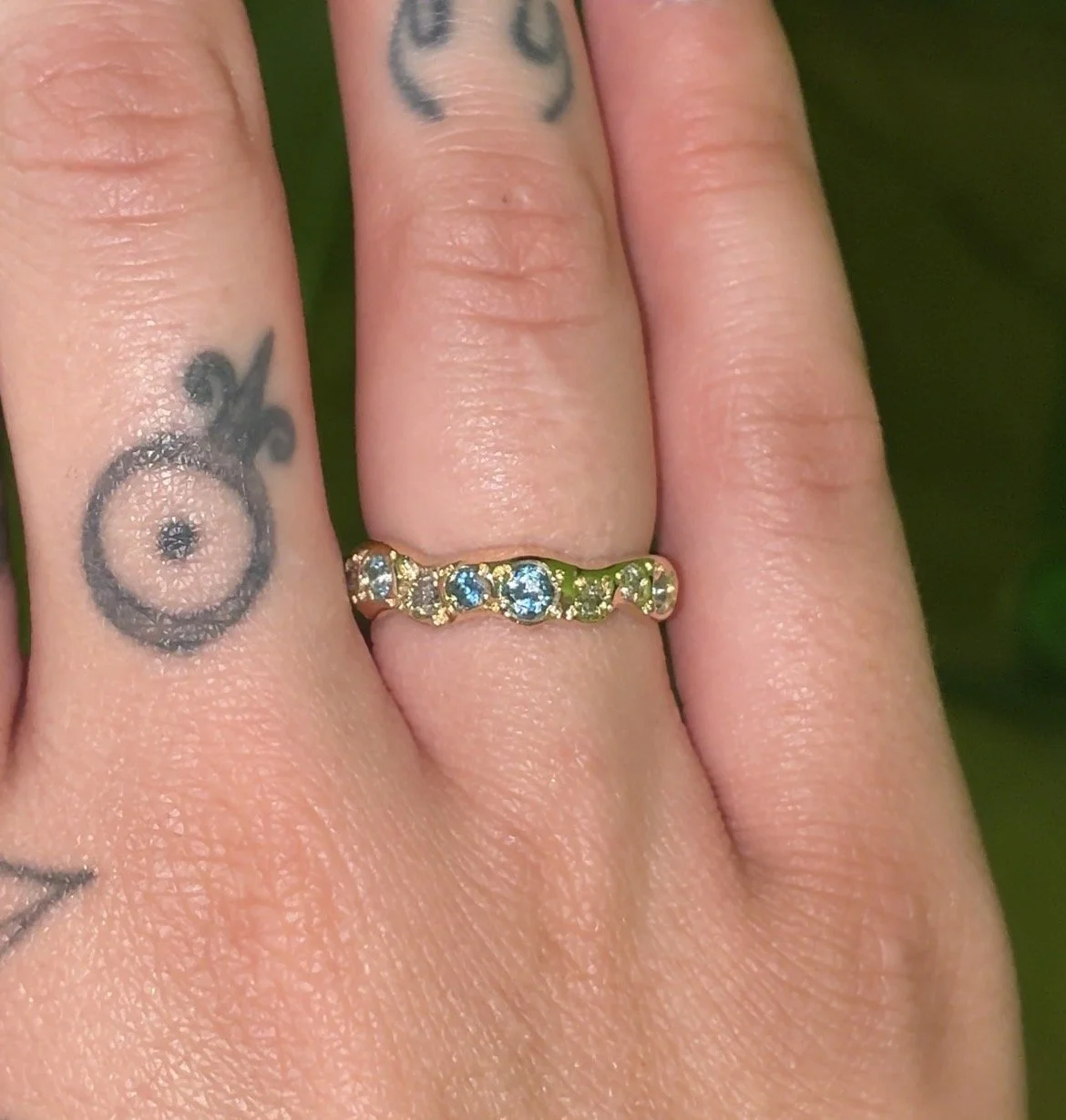 Uranus Ring gold - A molten gold ring with aquamarine and salt and pepper diamonds