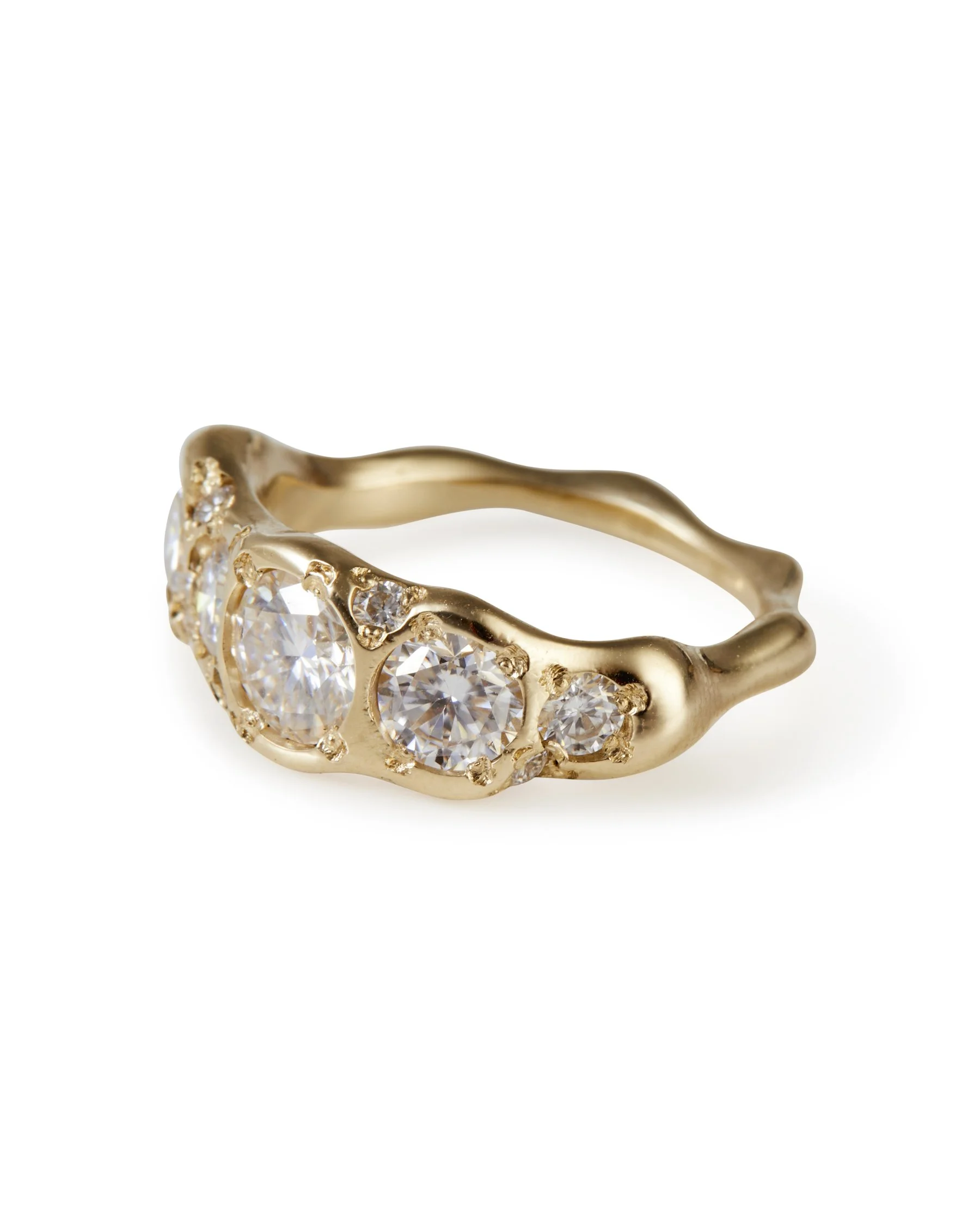 A molten statement ring with lab grown moissanite - side view