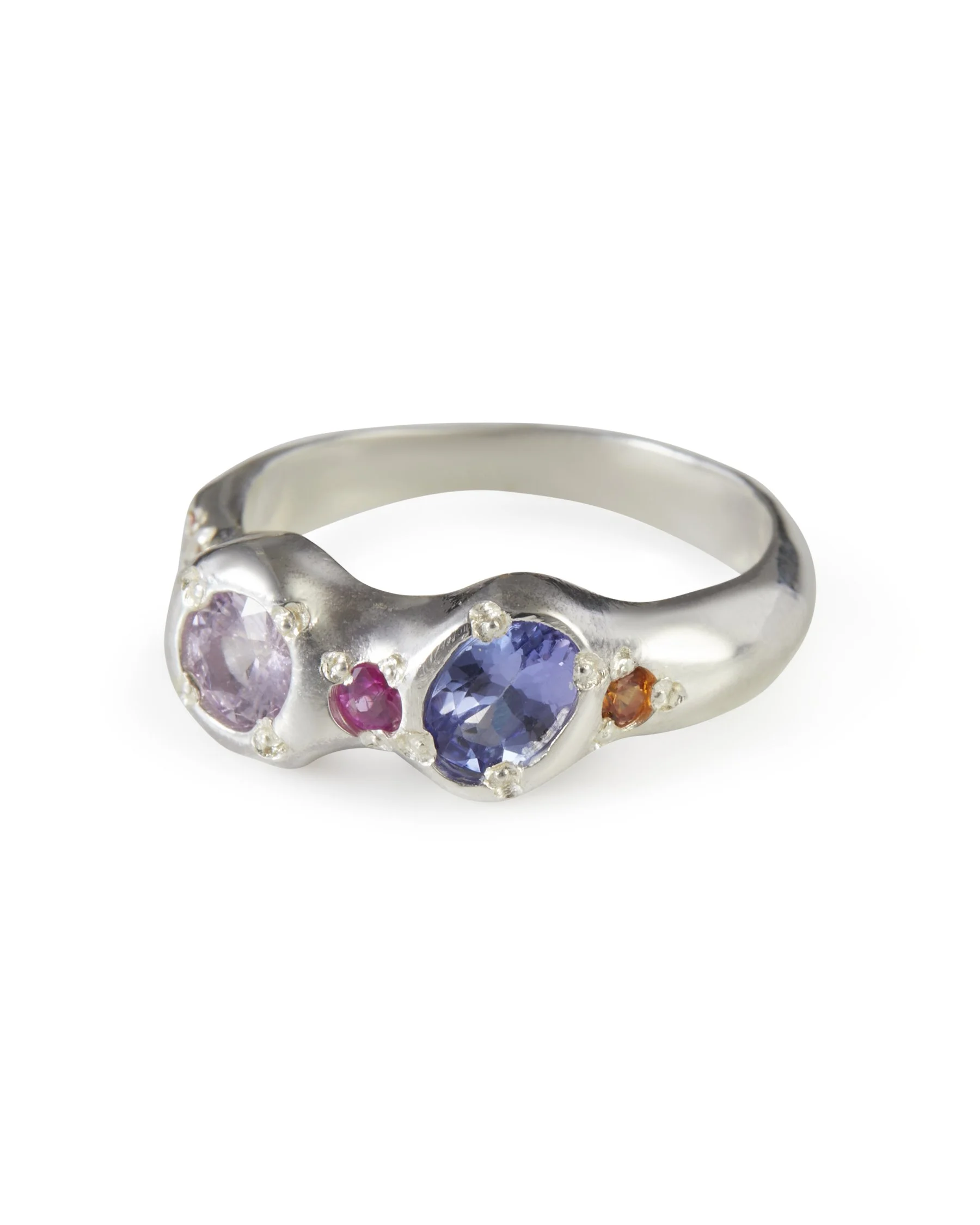 Side profile of the Princess Power Alien Eyes Ring with pink, purple and orange sapphires and tanzanite.