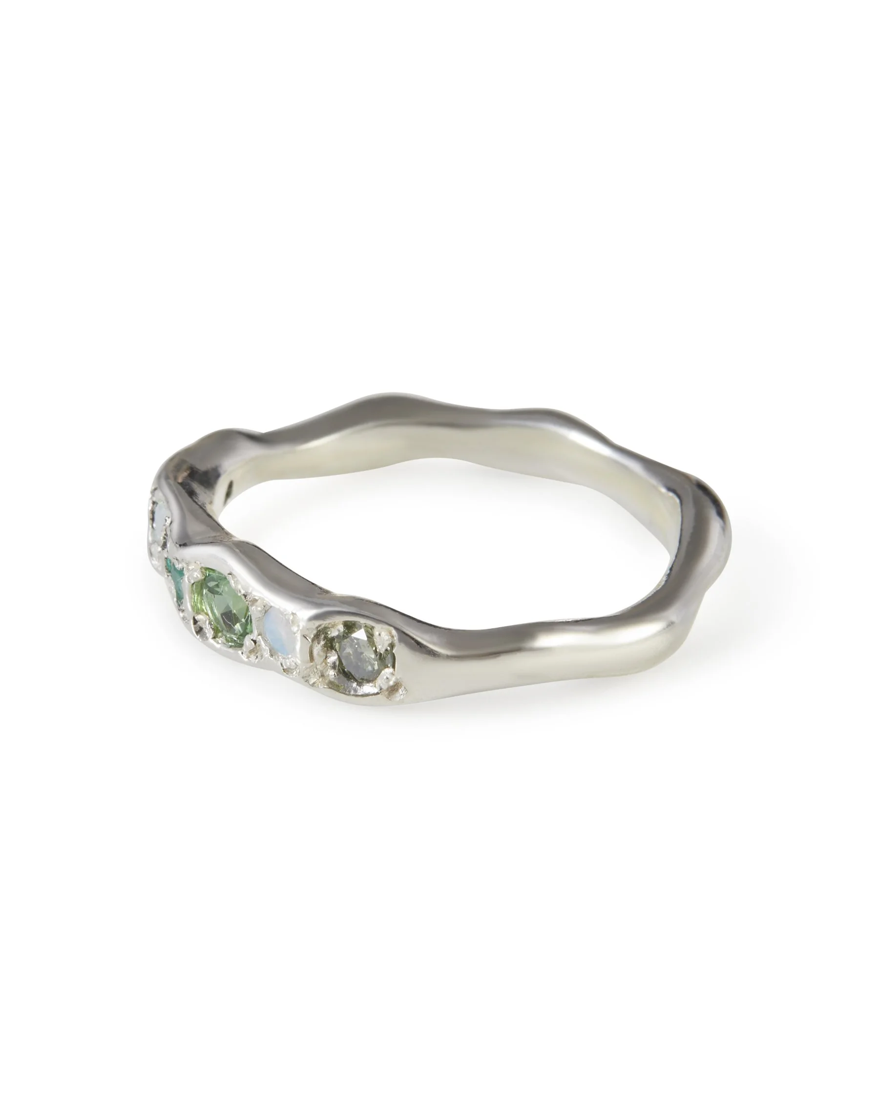 Side profile of the Moss Colne Ring in sterling silver with green diamond, opal and green gemstones.