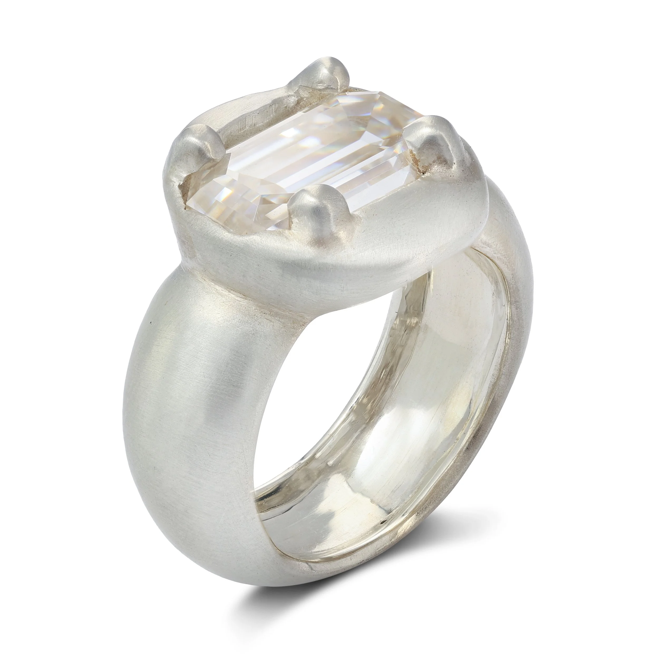 Uranus statement ring - a white gold puffy ring with an emerald cut moissanite in the centre