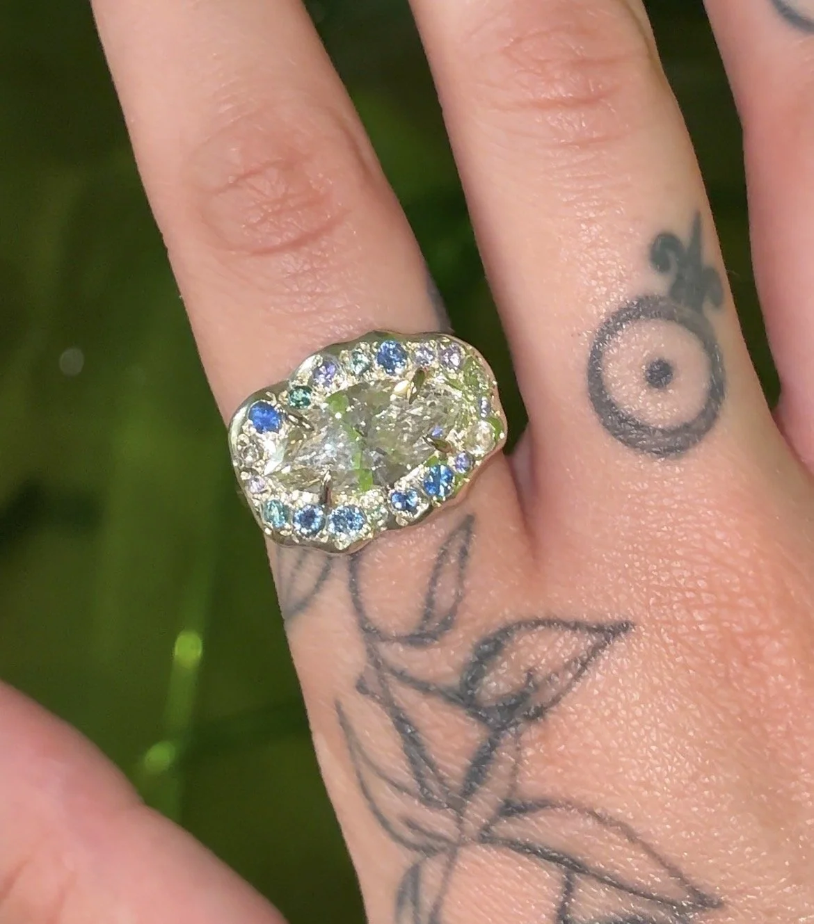 Mercury Staement Ring - A large white gold ring with purple and blue gemstones and a central marquise lab grown diamond