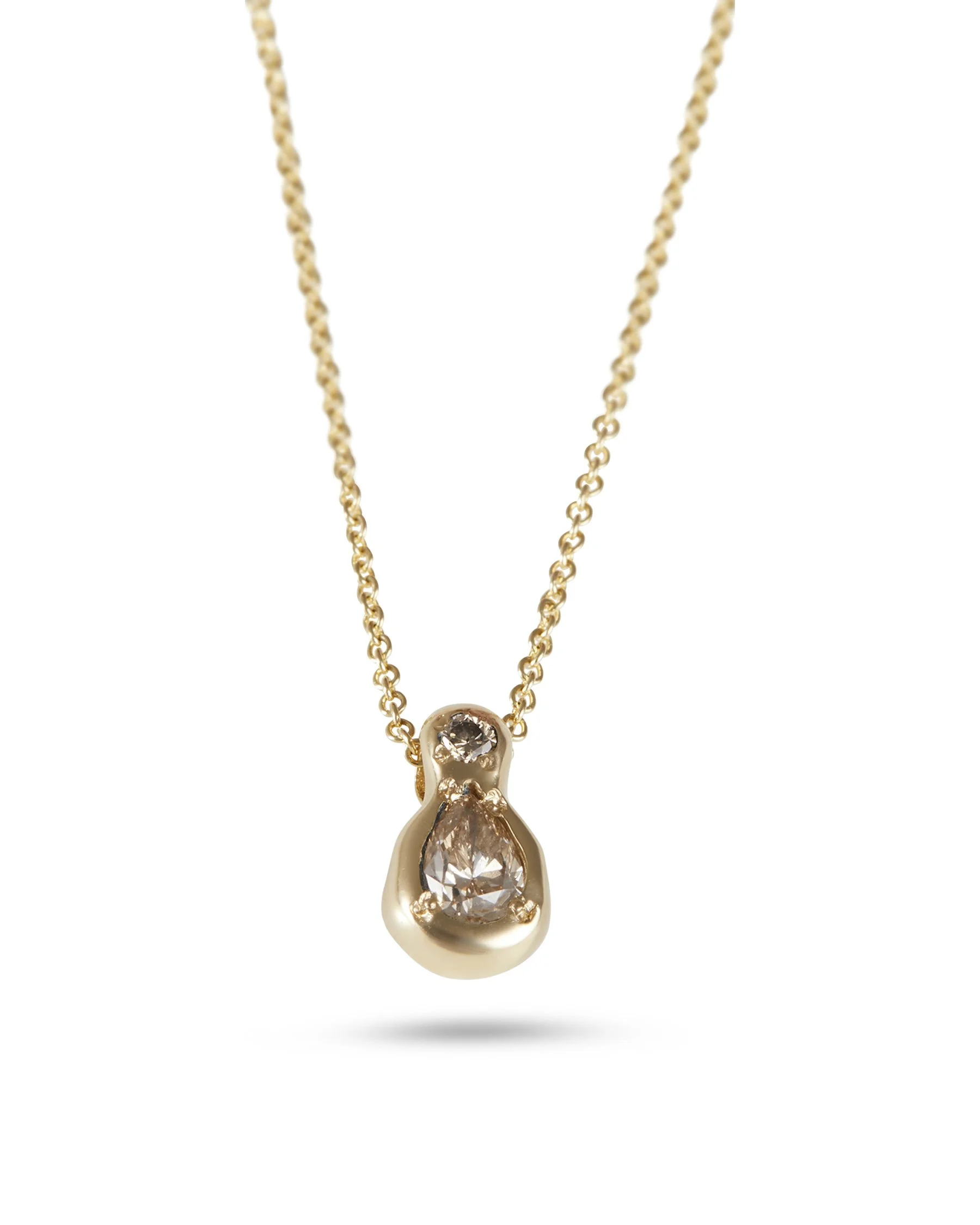 A brown diamond pear shaped mini pendant on a chain