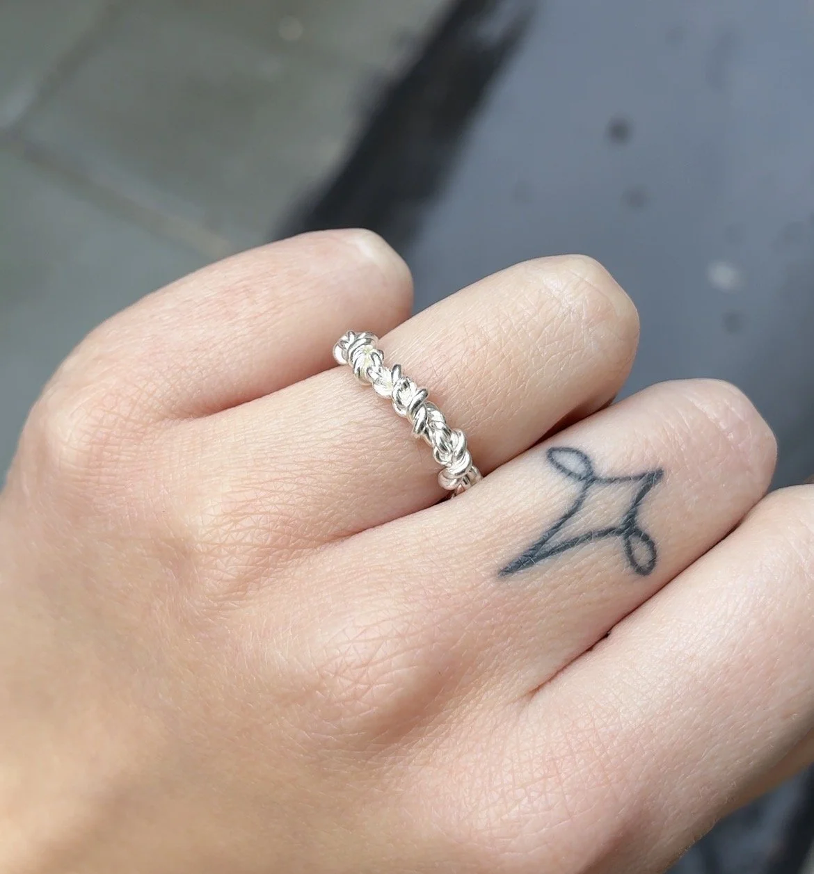rope ring on hand