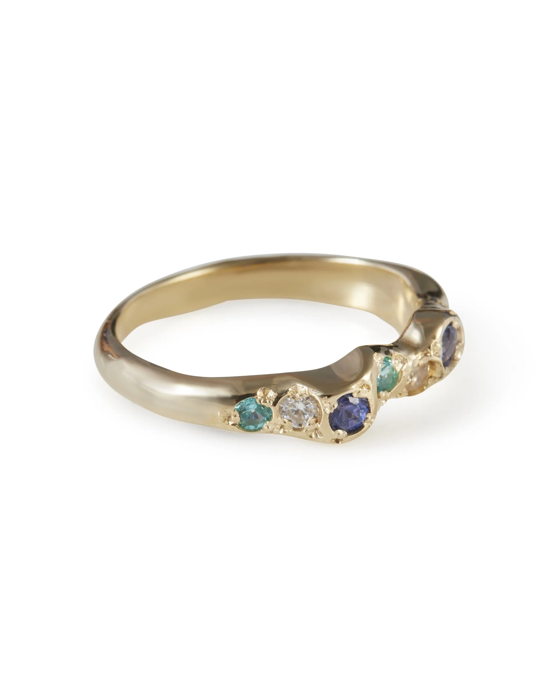 Side view of the Mermaid Mini Band ring in 9ct yellow gold featuring purple sapphires, paraiba YAG, moonstone and moissanite.