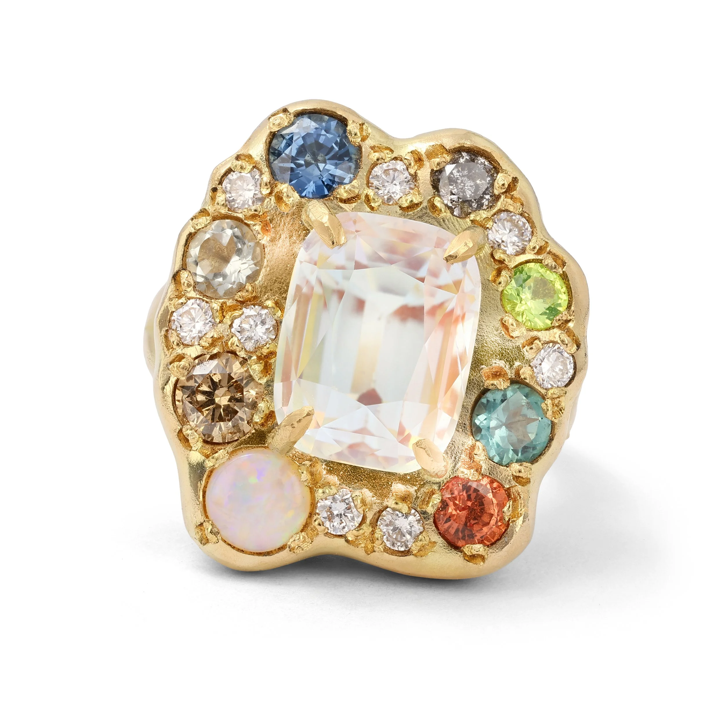 A cluster Ring inspired by the moon and planets containing different gemstones in yellow gold