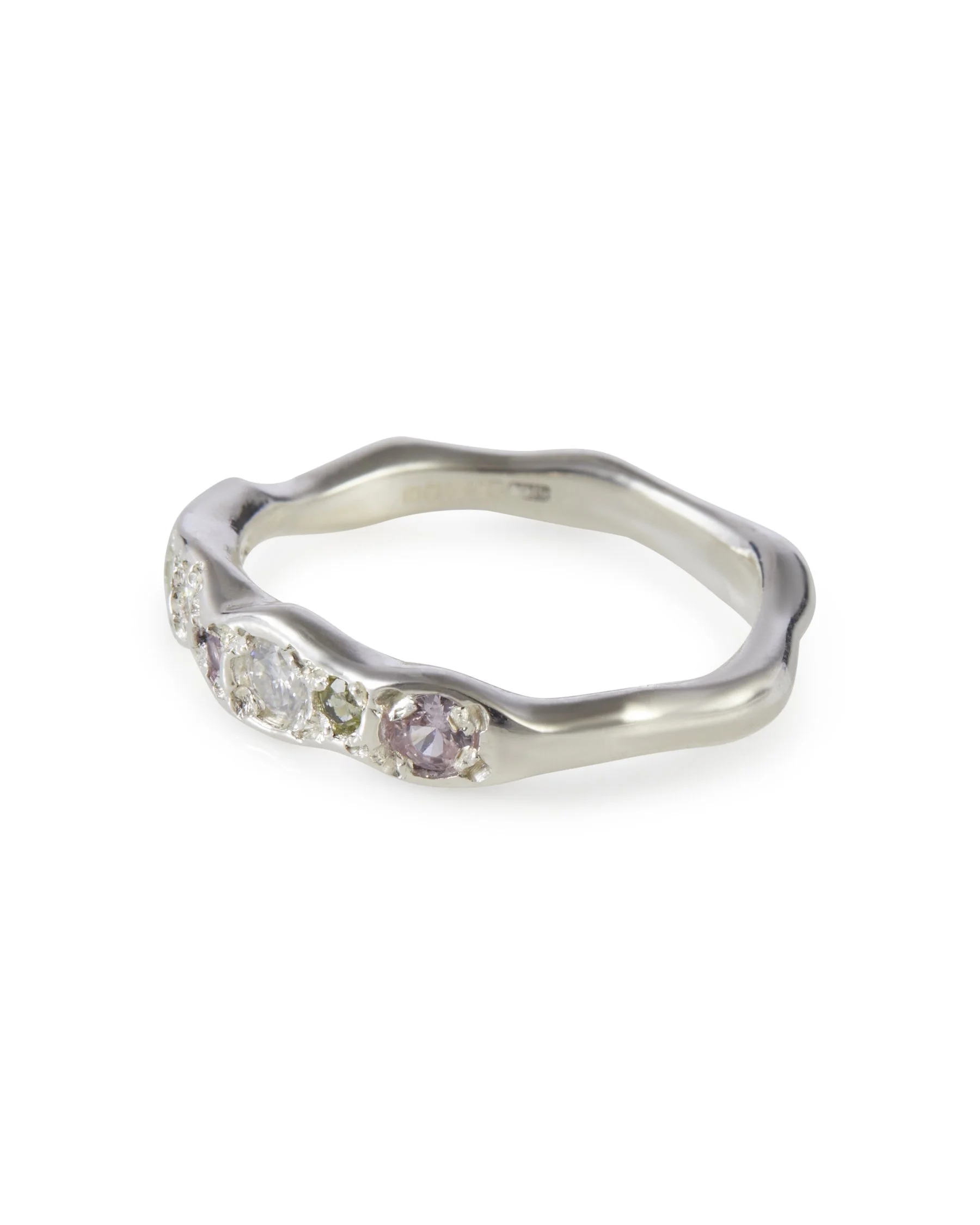 Side profile of the Petal Colne Ring with pink sapphire, peridot and lab grown moissanite.