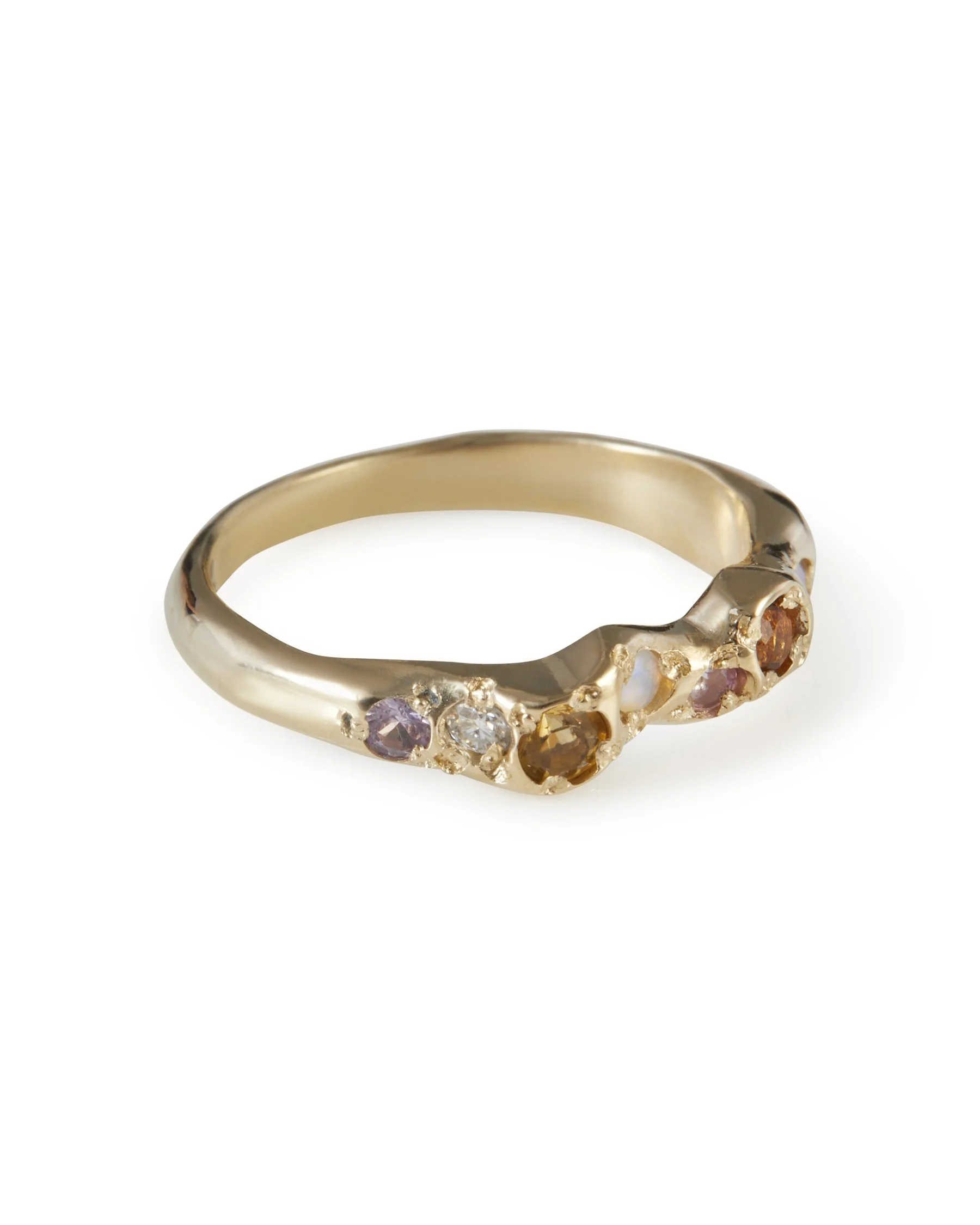 Angled view of the Springtime Mini Band featuring citrine, opal and pink sapphire in 9ct yellow gold.