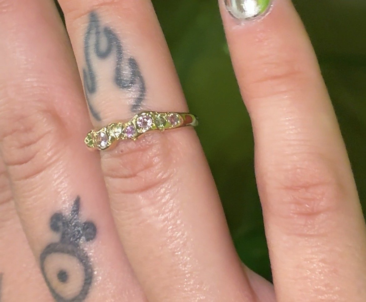 Venus band gold - a gold molten band with green and pink gemstones inspired by venus