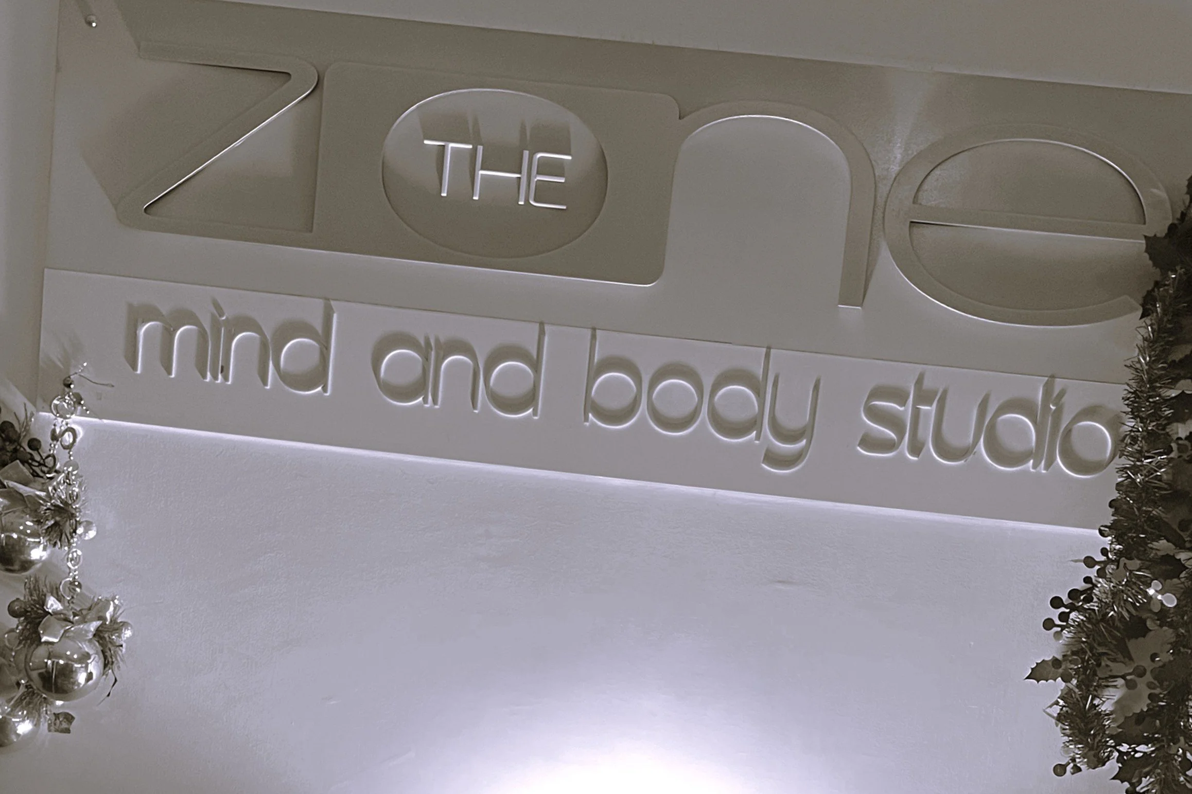 Pilates studio signage decorated for festive season