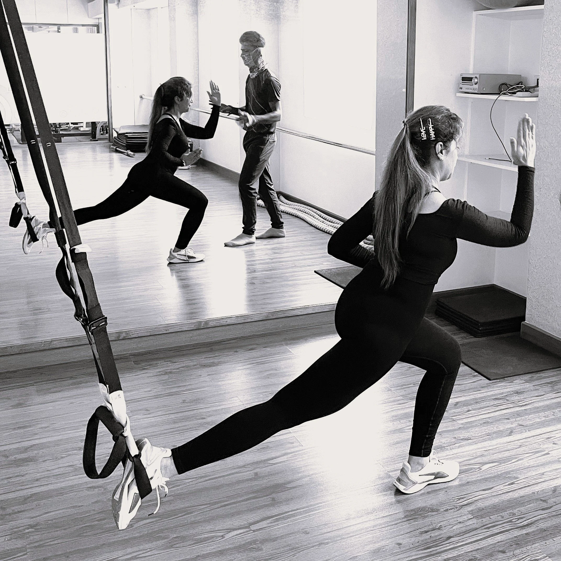 Client in a TRX personal training session at The Zone Mind and Body Studio, Bangalore