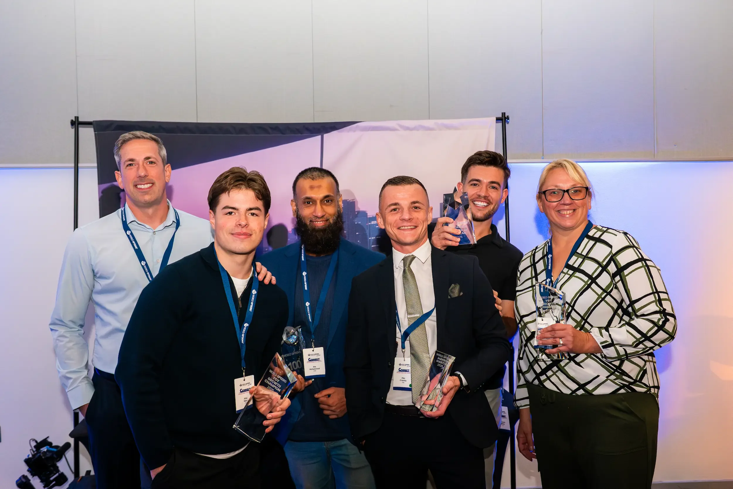 2025 World Options Connect Award Winners (L-R: Matthew Mansfield, Alex Marr, Ata Muhammad, Alex Crawley, Cameron Wilkey and Lynn Dignan.)