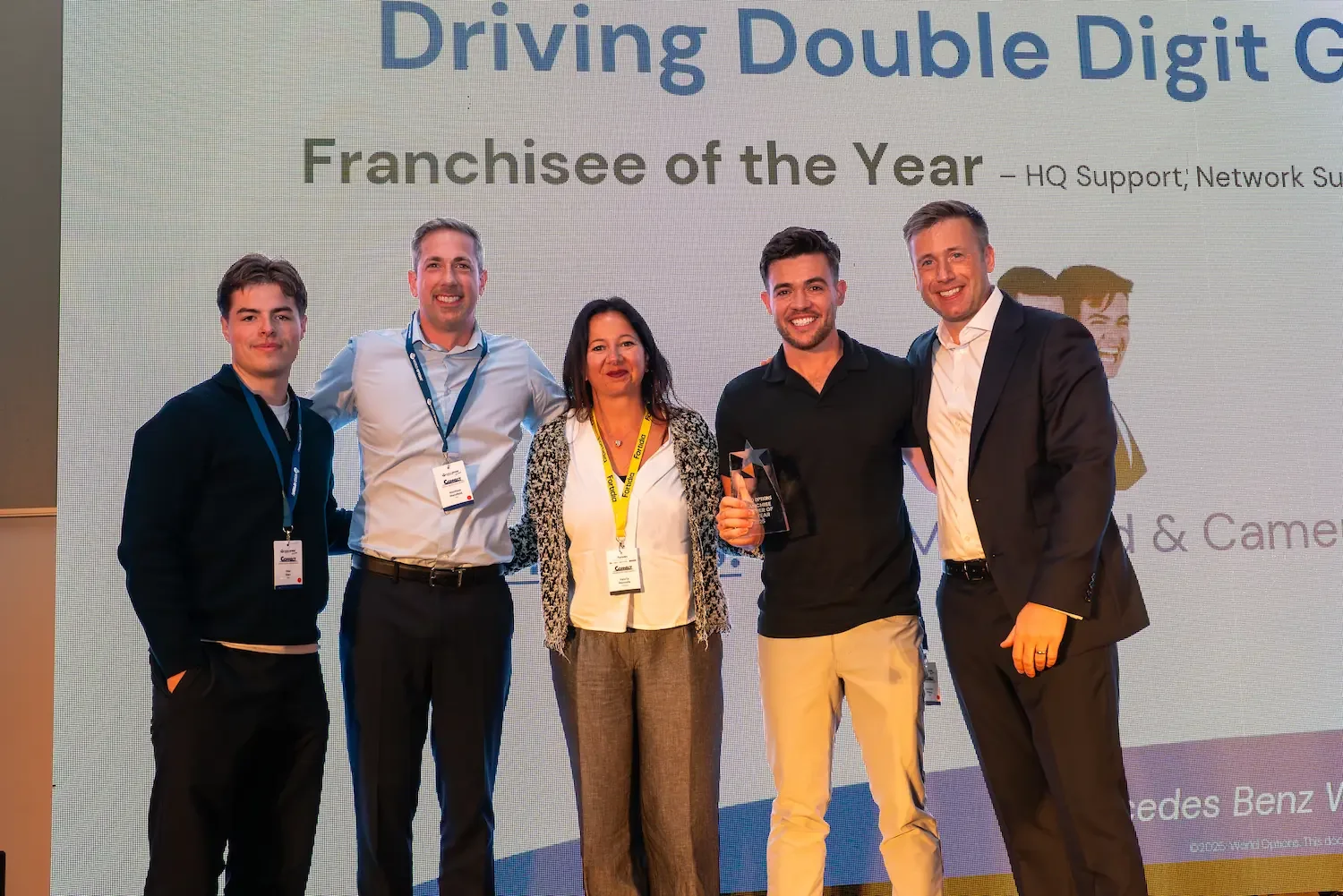 2025 Franchisee Of The Year (L-R: Alex Marr, Matthew Mansfield, Valeria Mennella, Cameron Wilkey, Michael Gratton)