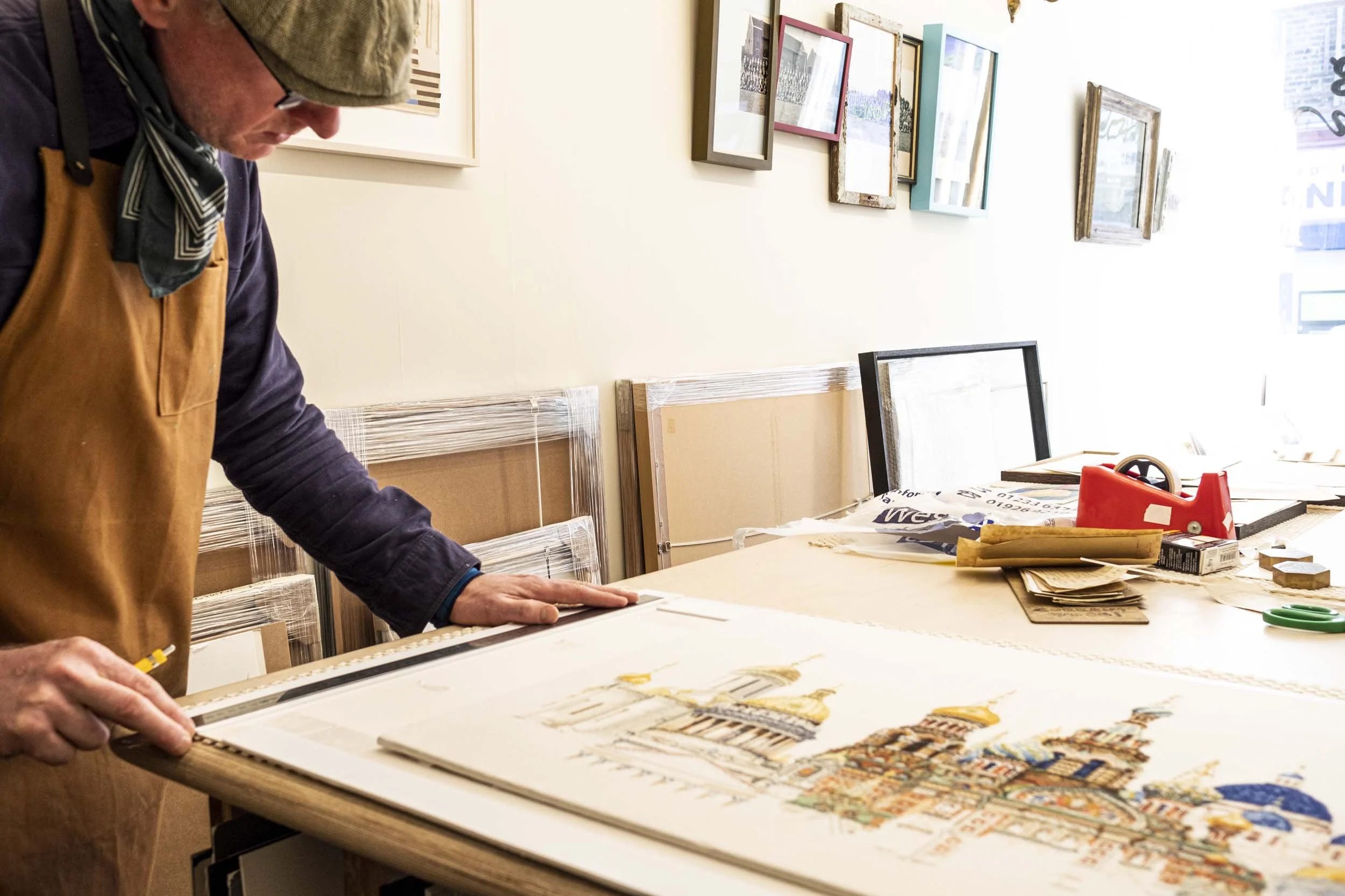 white male measuring cityscape artwork.jpg