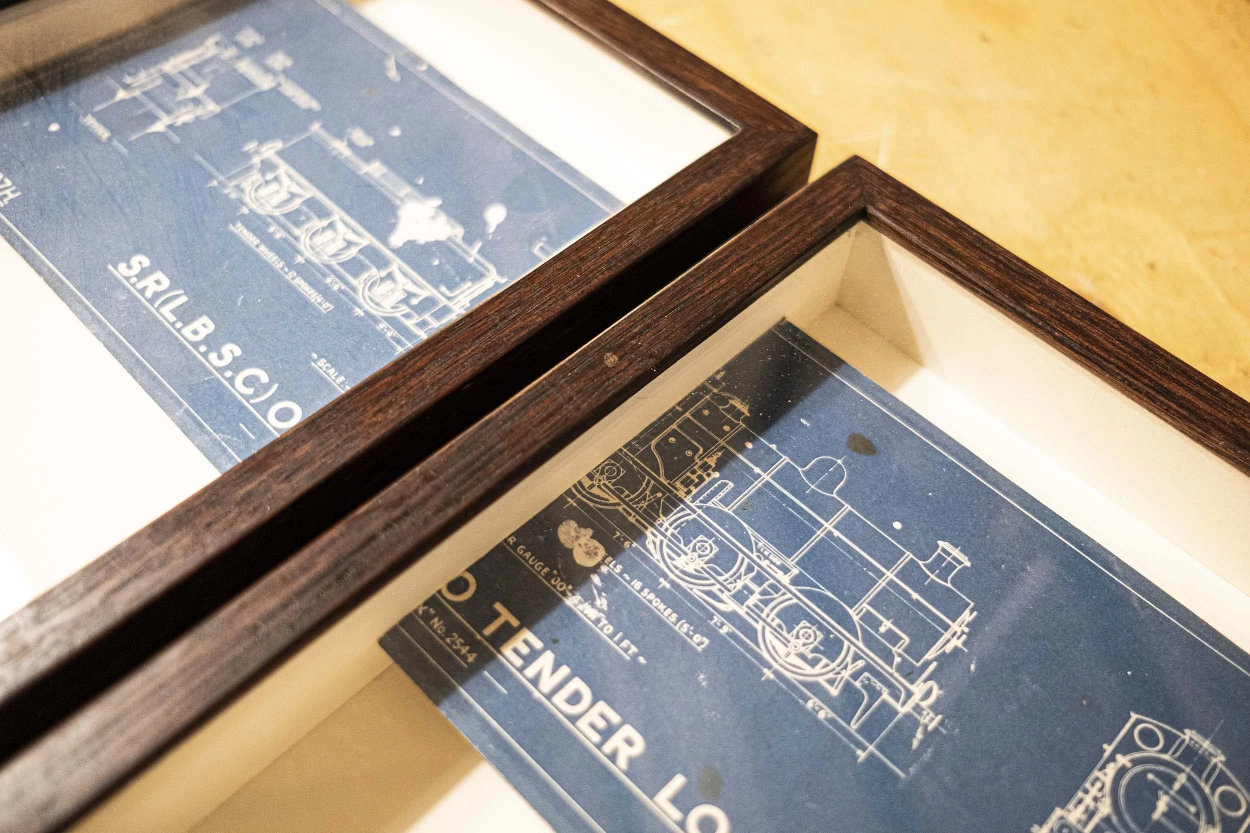 two blueprints framed in dark wood 03.jpg