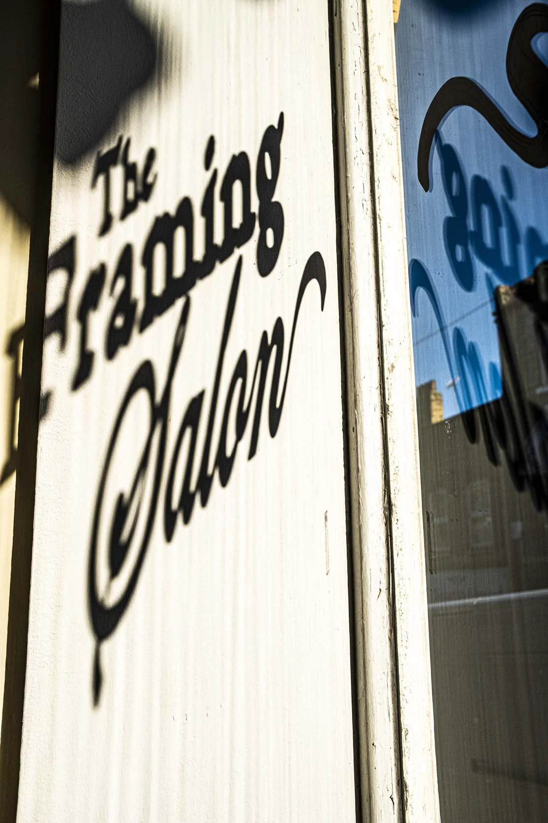 the framing salon shop sign shadow.jpg