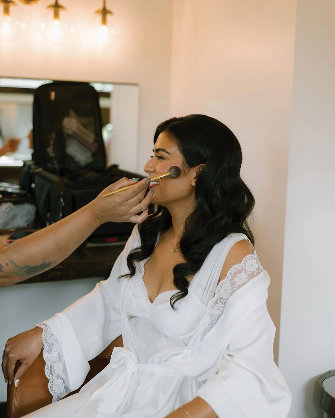 Makeup artist working on a bridal client