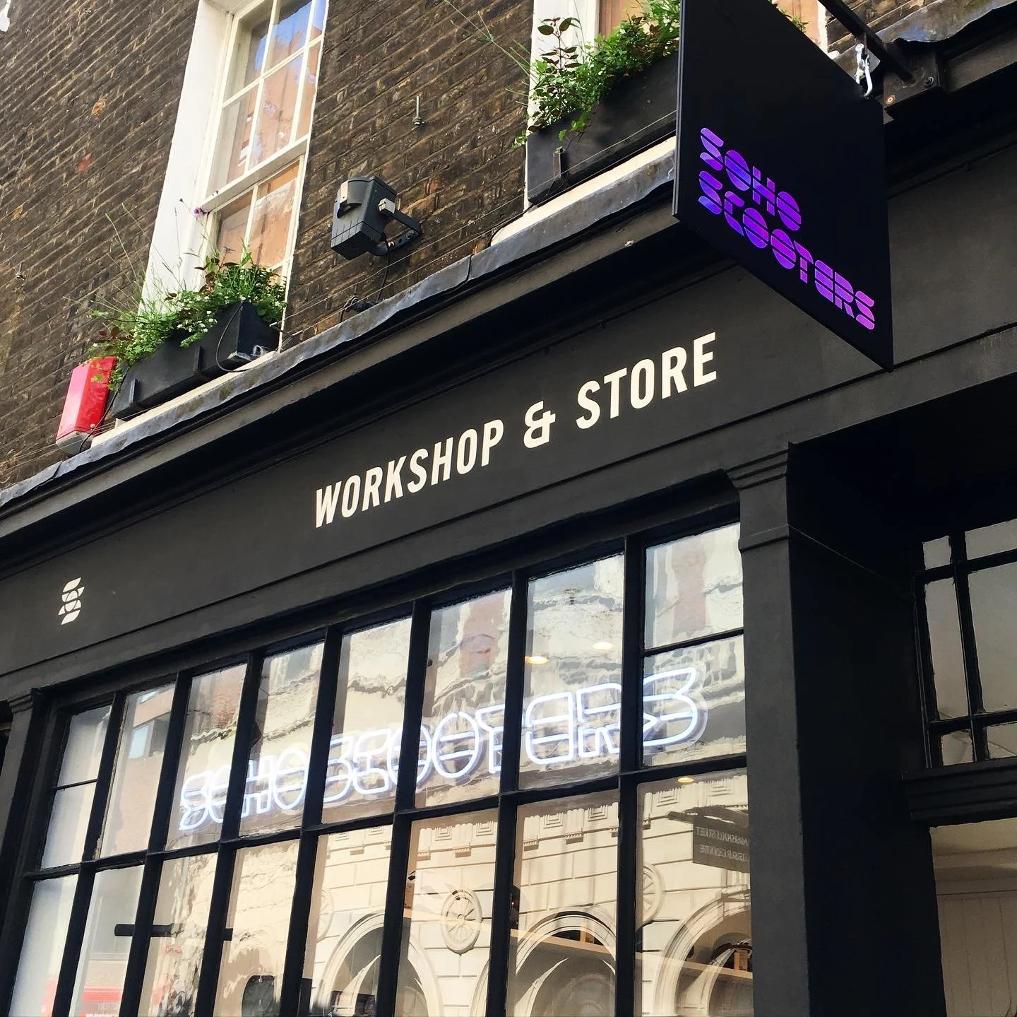Handpainted Shop Sign
 Soho, London, UK 