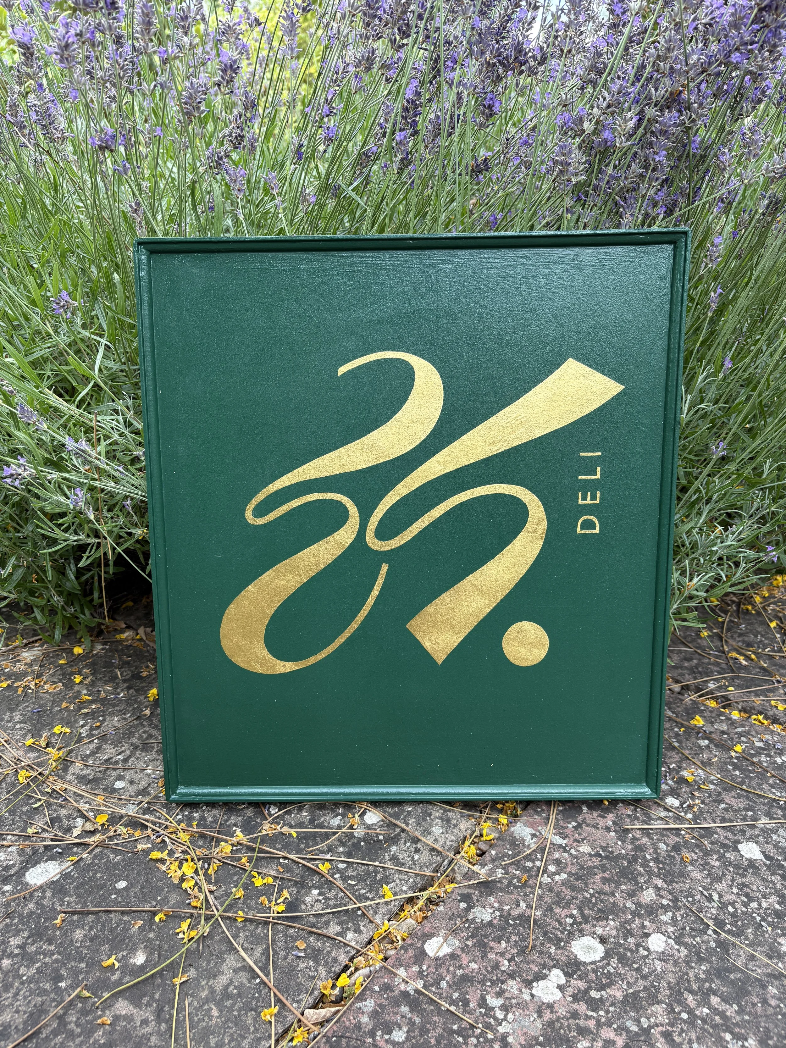 Hand gilded shop fascia
 Earsham St. Deli, Bungay, Suffolk, UK 