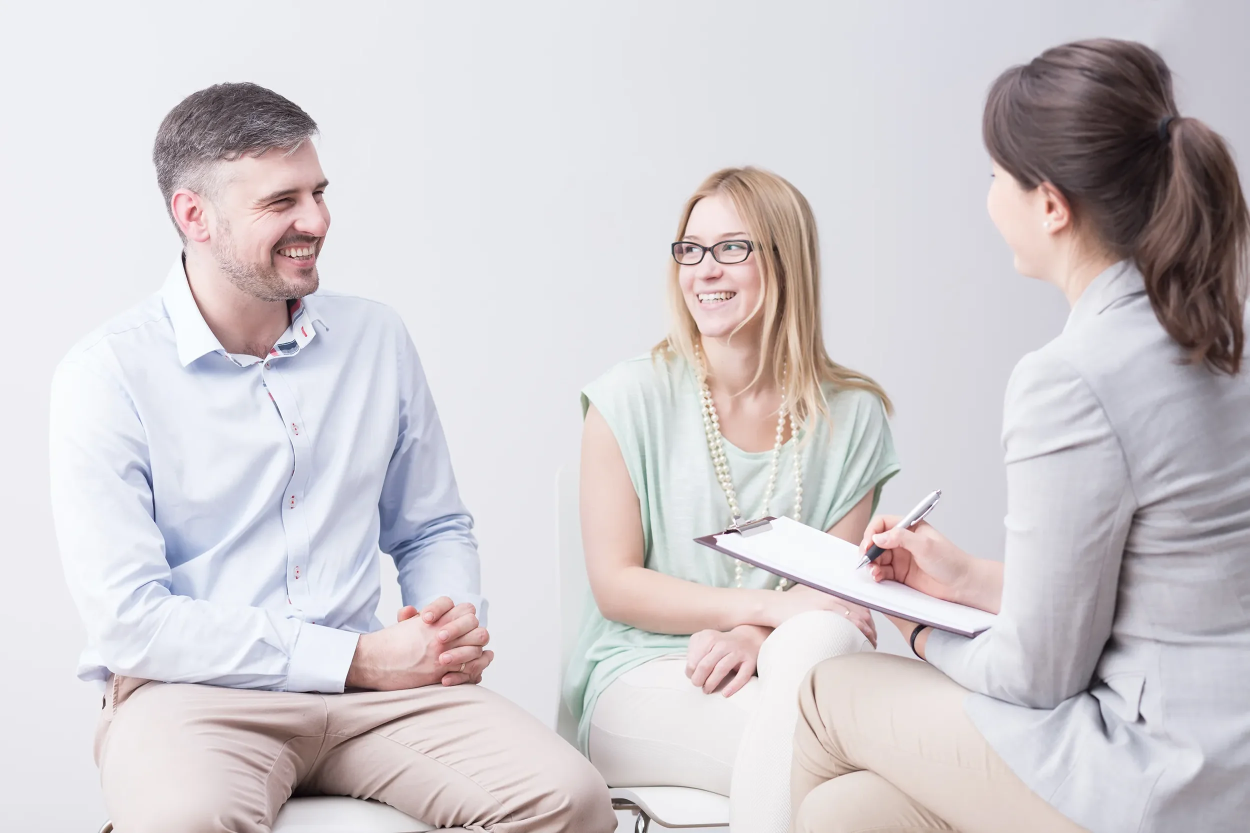 couples smiling in couples therapy