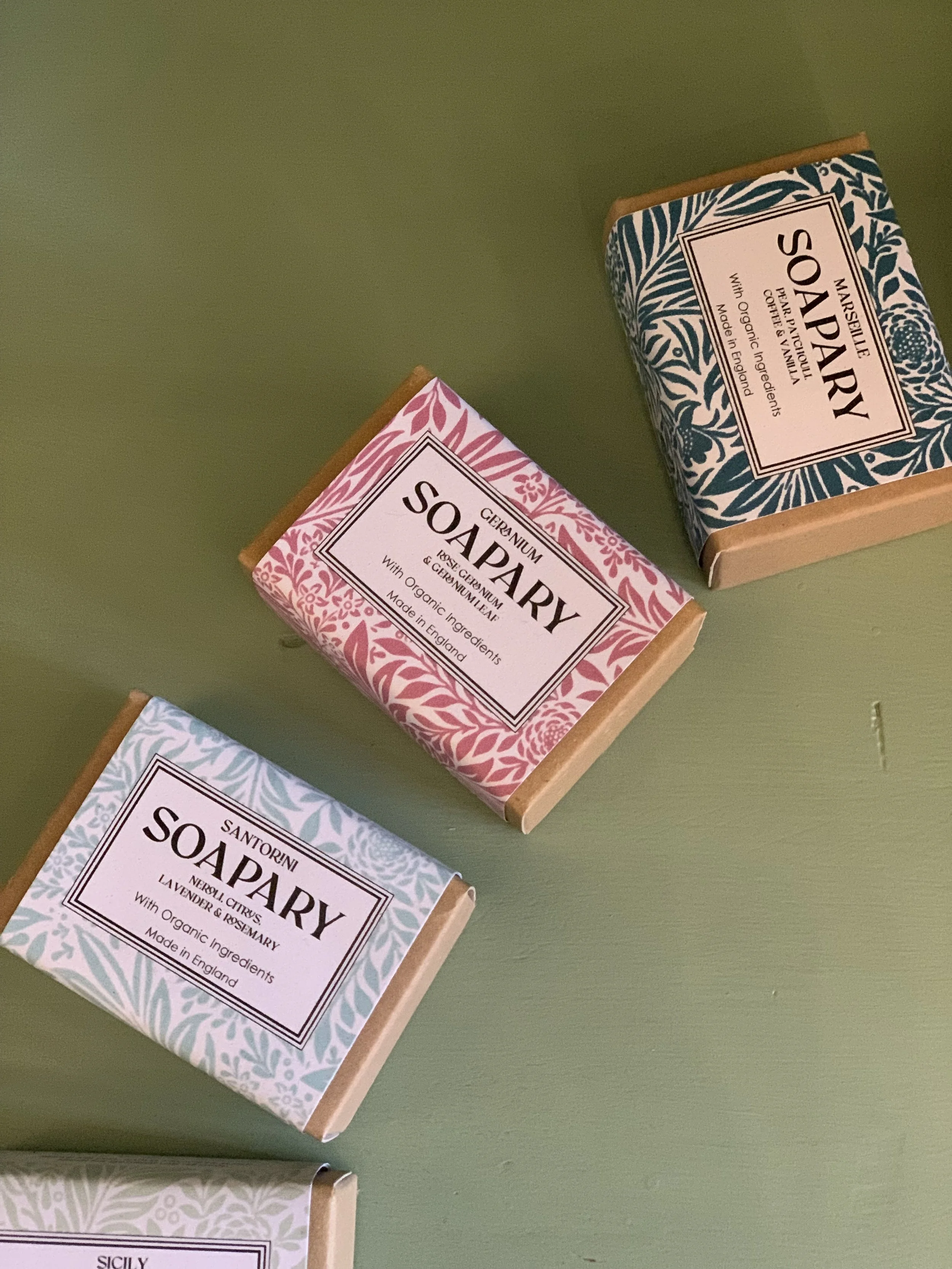 cold processed organic soaps in colourful floral print wrapper