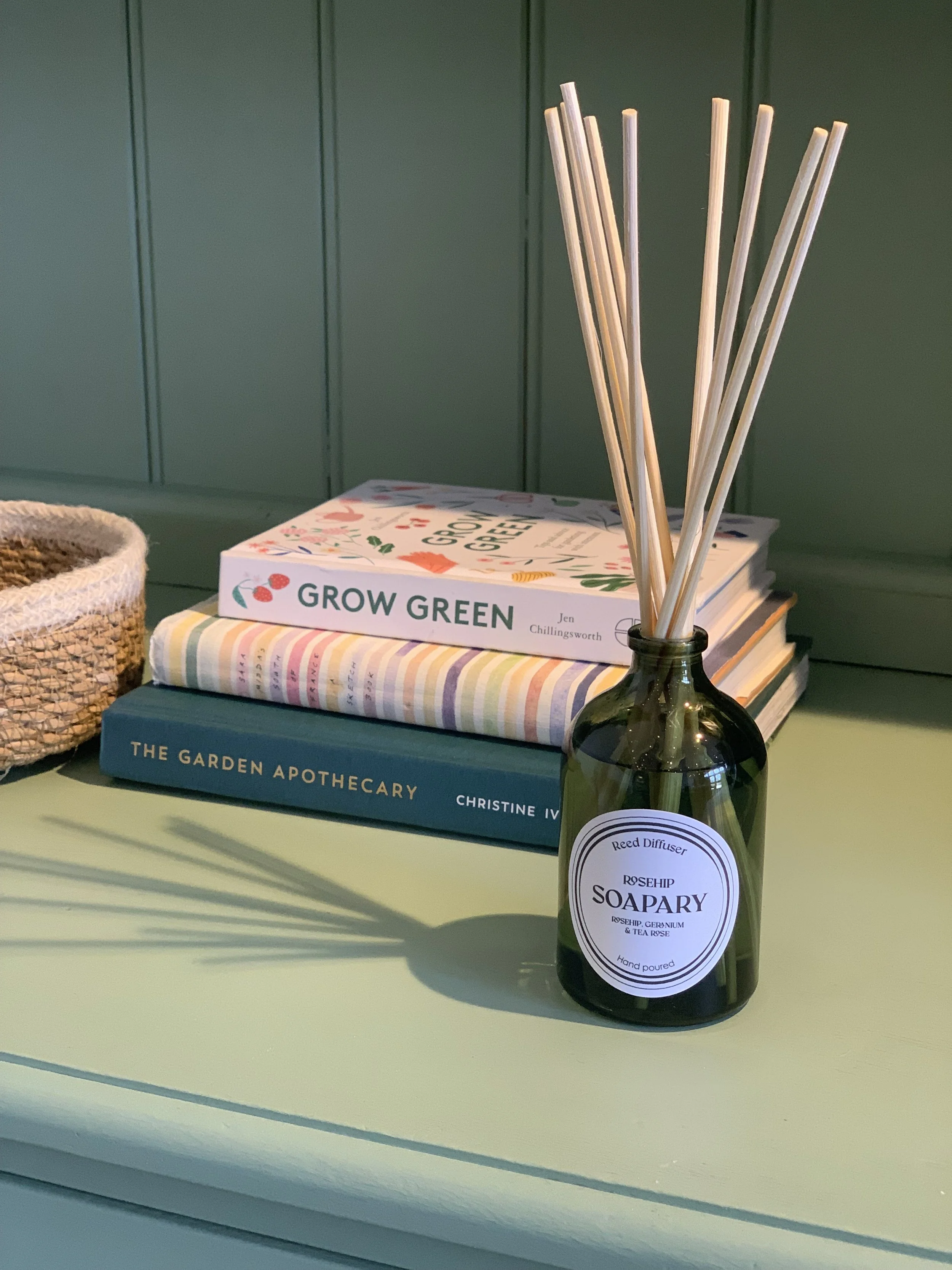 diffuser and books on a shelf
